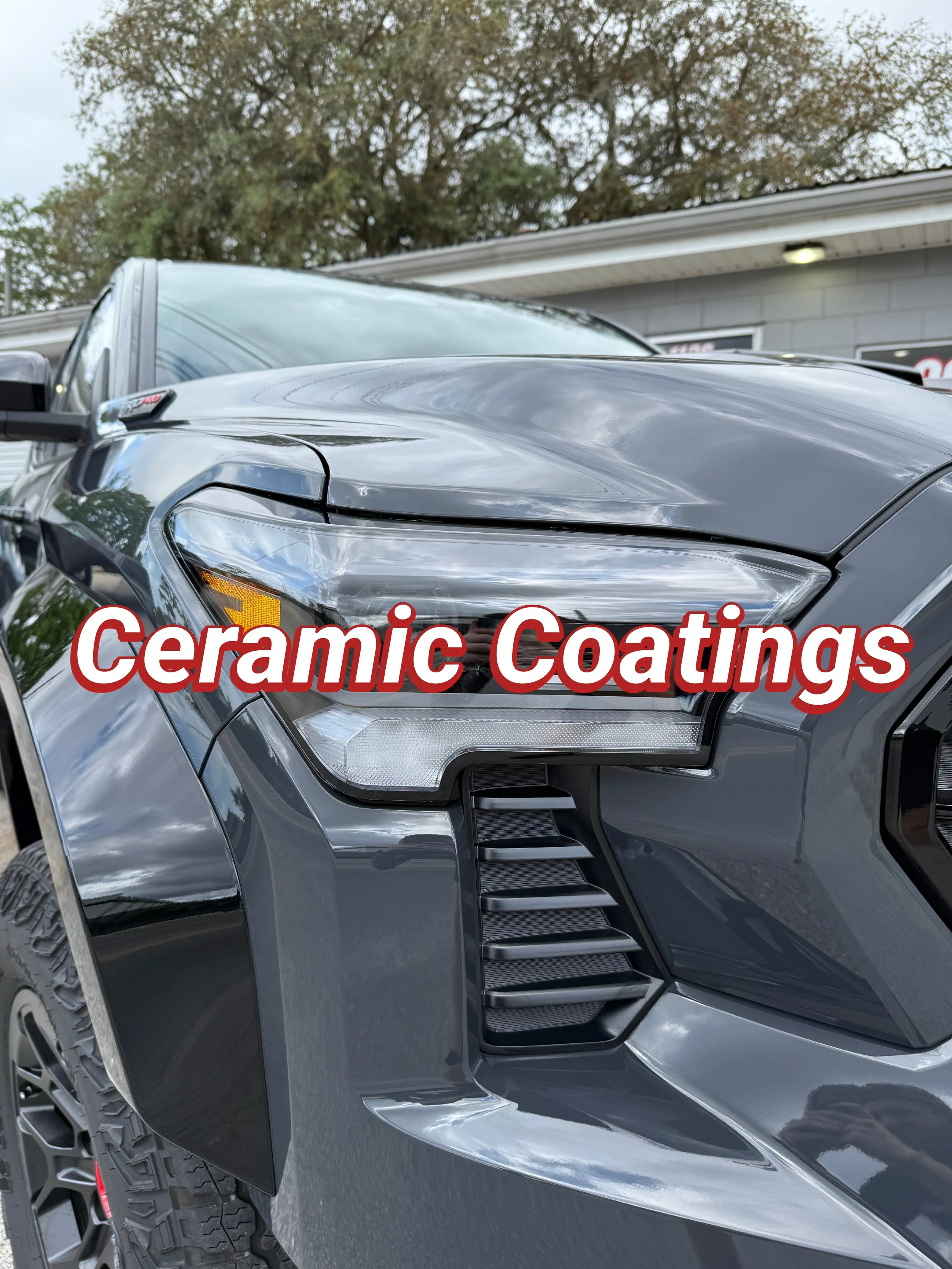 Car hood with a towel, a small container, and the text 'CERAMIC COATING' overlayed.