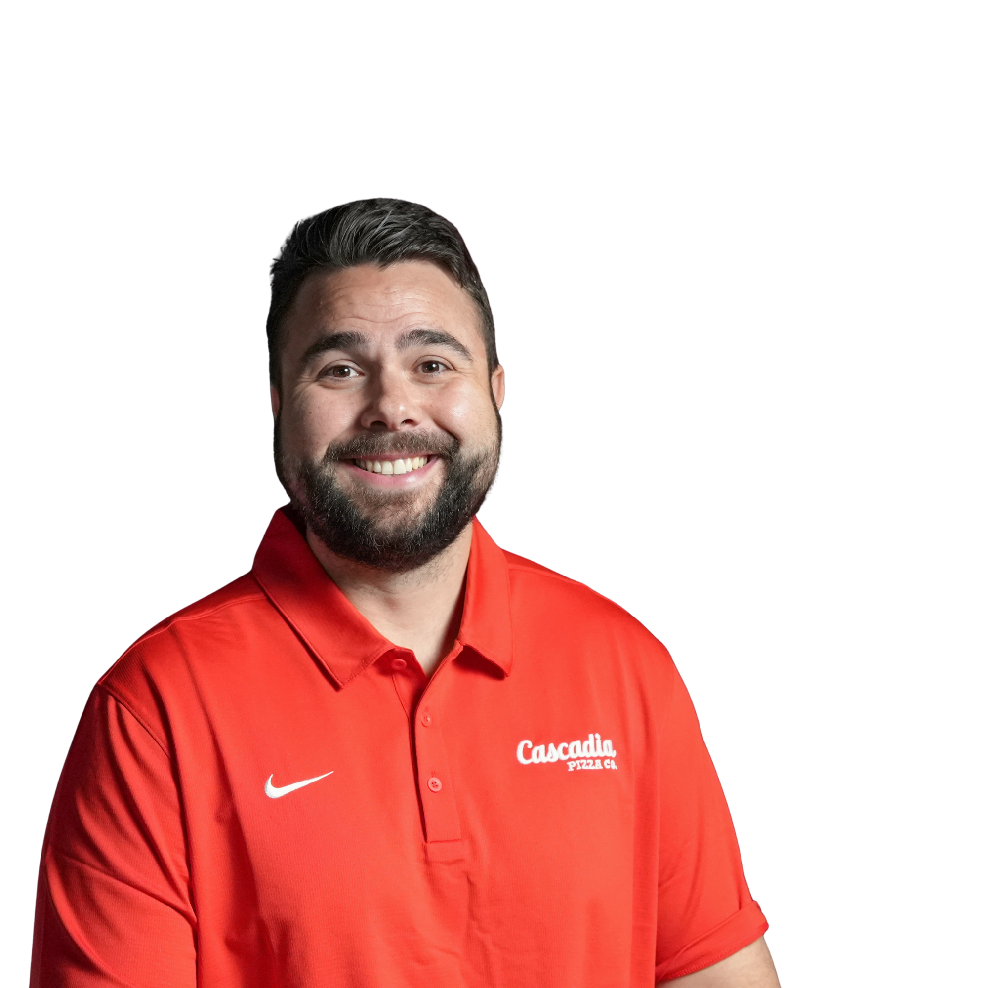 Close-up of a smiling man wearing a red collared shirt with a logo for Cascadia Pizza Co and a white Nike logo.