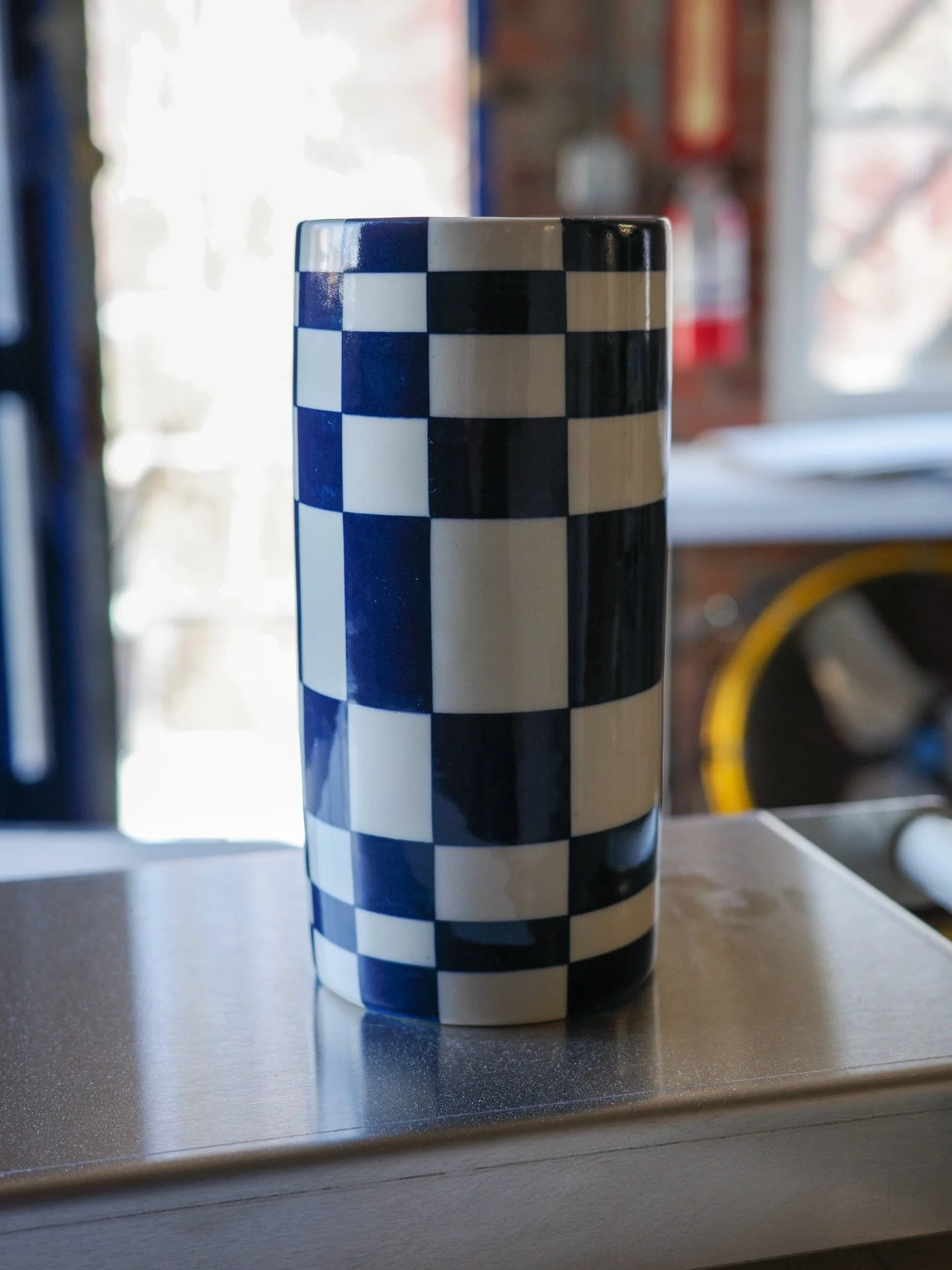 This vase sold before I had the chance to have it properly photographed, so this photo on a dusty kiln lid will have to do. Back in the studio for a few days before we head to New Orleans for spring break next week 💙