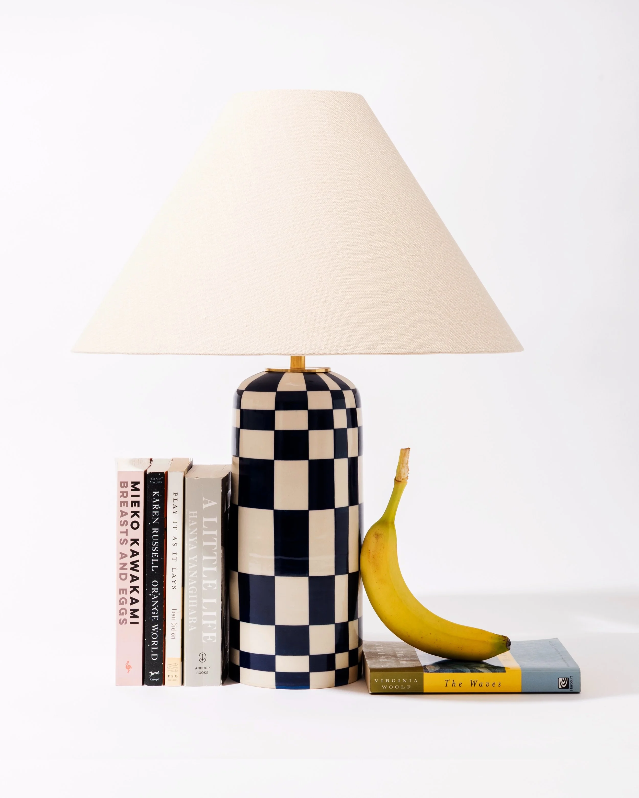 Lamps are here after lots of dreaming and scheming&mdash;wheel thrown and built/wired by me. I&rsquo;m excited to bring a few with me to @pottersmarketatthemint this weekend! 

This babe is pictured with one banana and a few of my favorite books by @
