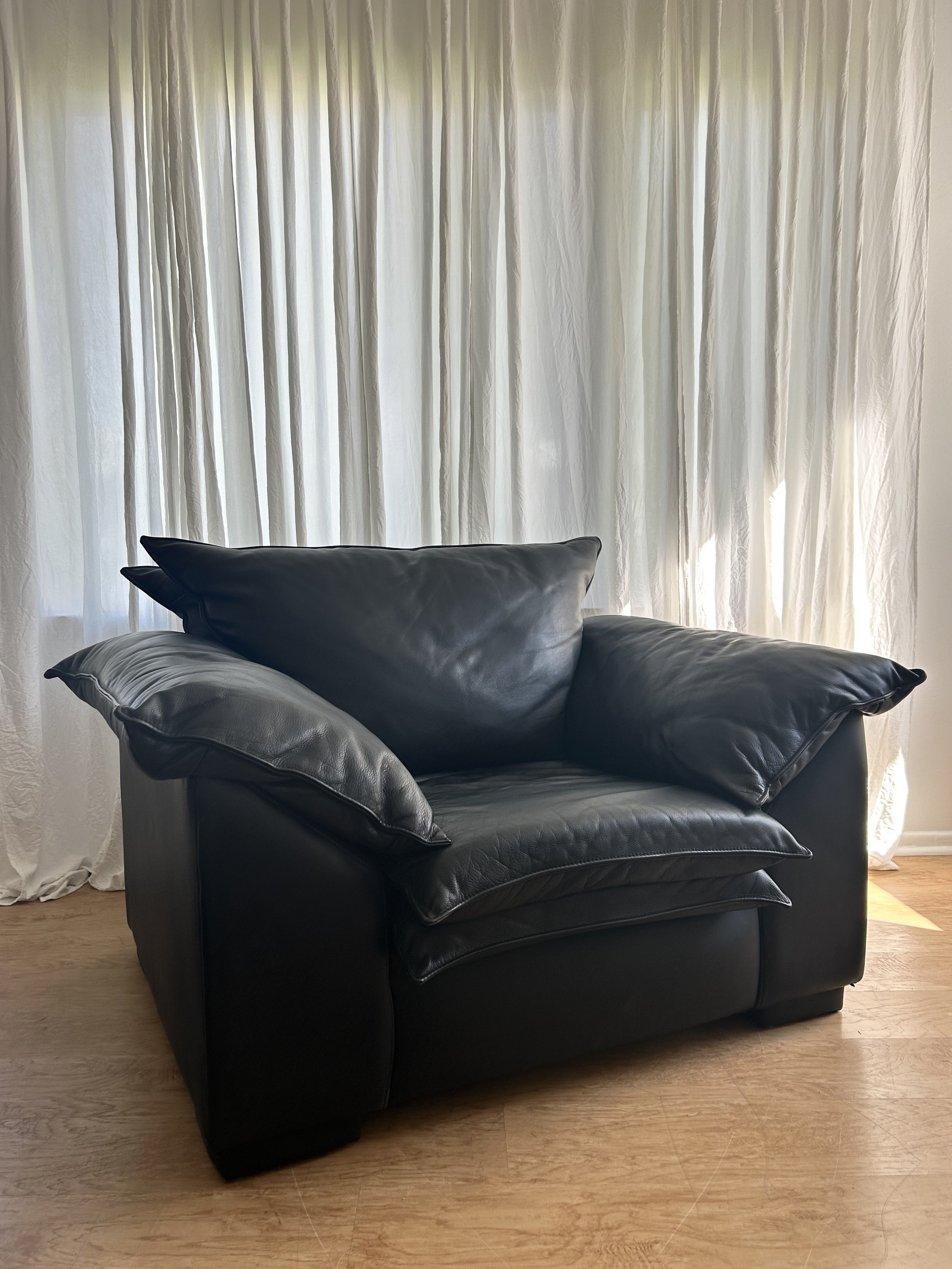 post modern black leather comfy chair - sold