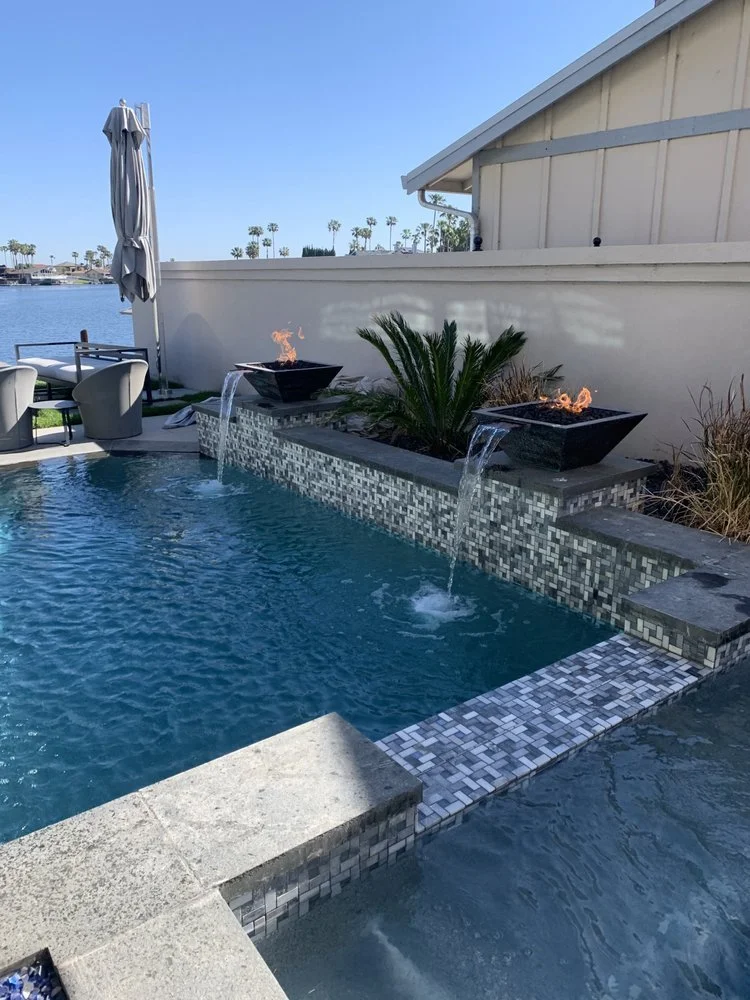Fire Water Bowls around custom tile pool