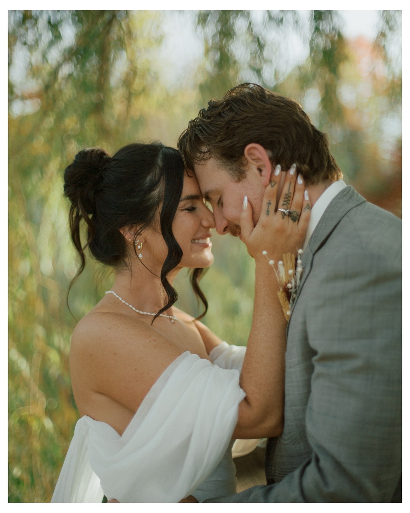 Emotional wedding portraits on a hot summer afternoon|