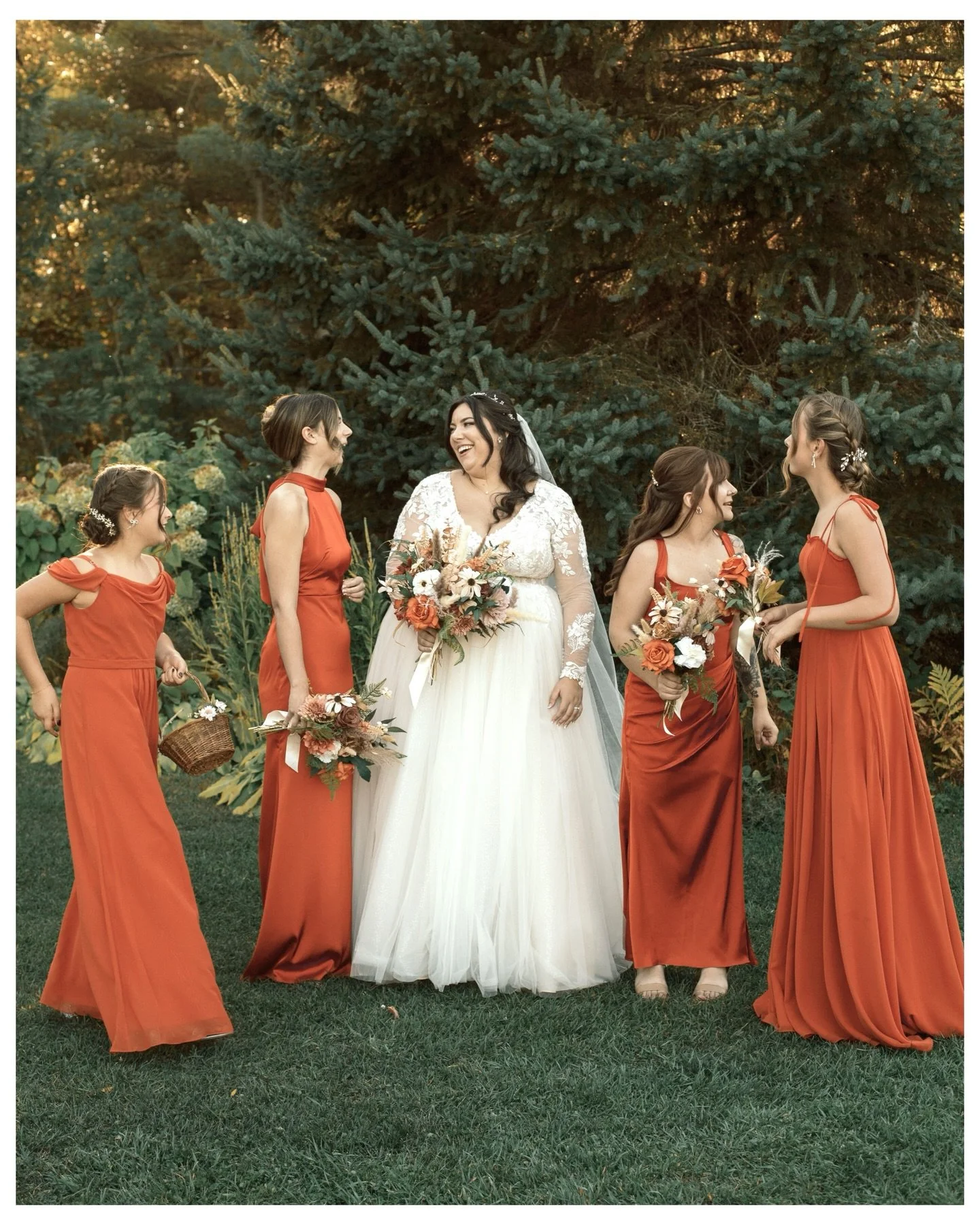 B + A&rsquo;s colourful rustic celebration in the countryside outside of Ottawa. Their mix of tradition with their own creative twists was beautiful to photograph. Love this candid of the bride and her bridesmaids at golden hour 📸💫