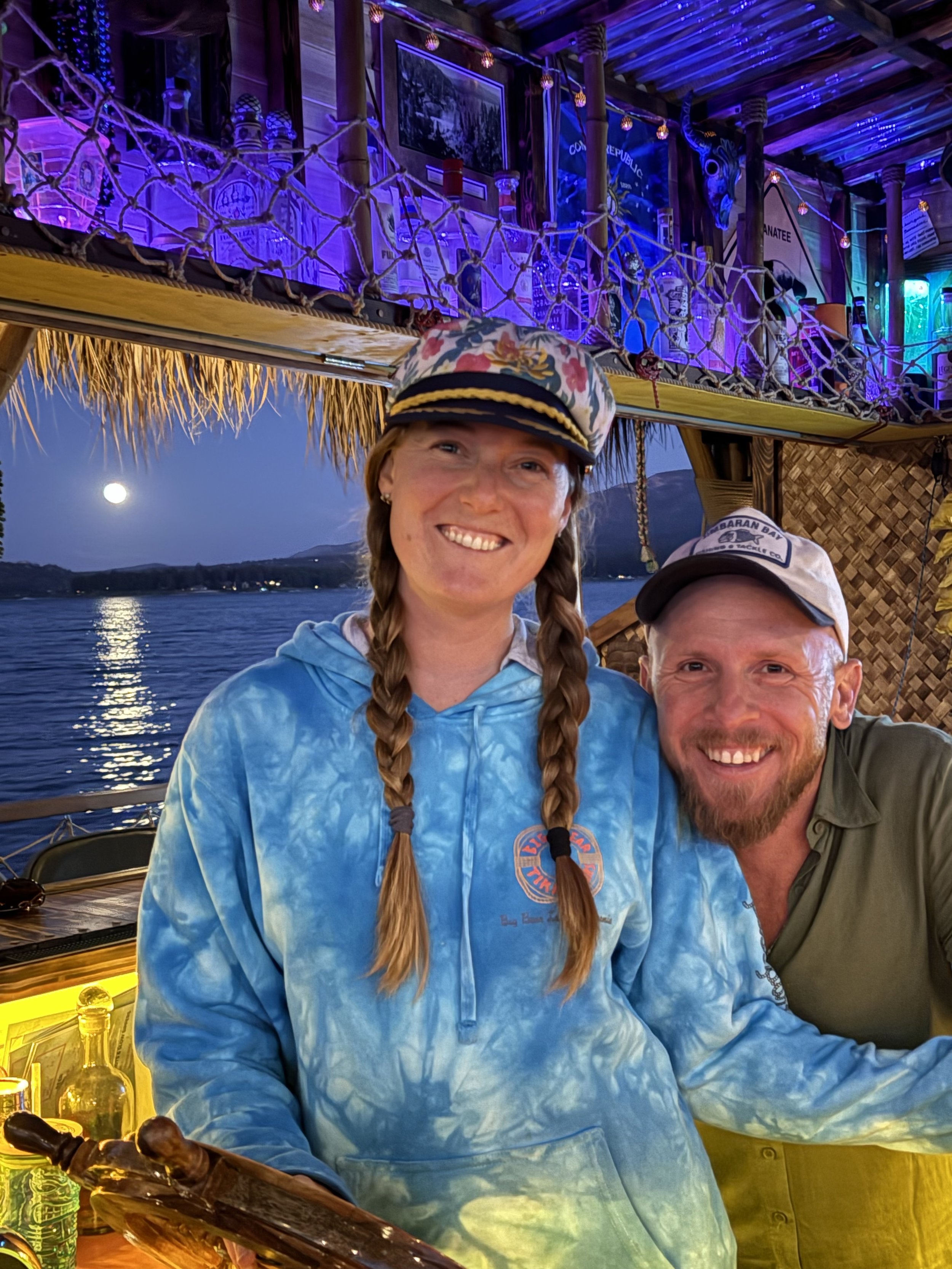 Captains hard at work during a full moon tour on the Big Bear tiki boat