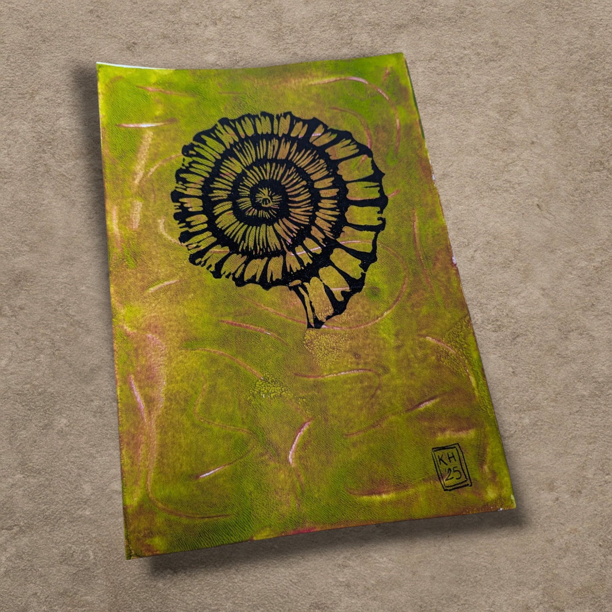 Ammonite: Forest Spiral  - hand-printed lino print on monoprinted background