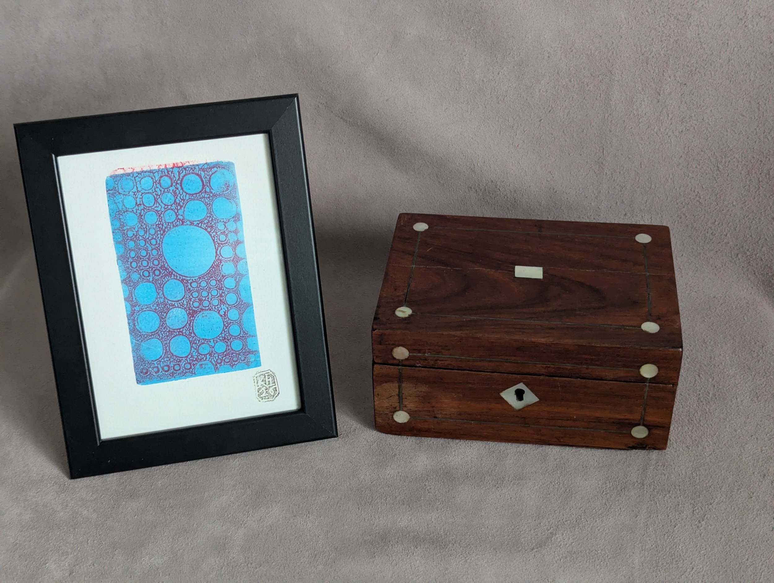 Turquoise and Red iridescent abstract circles monoprint