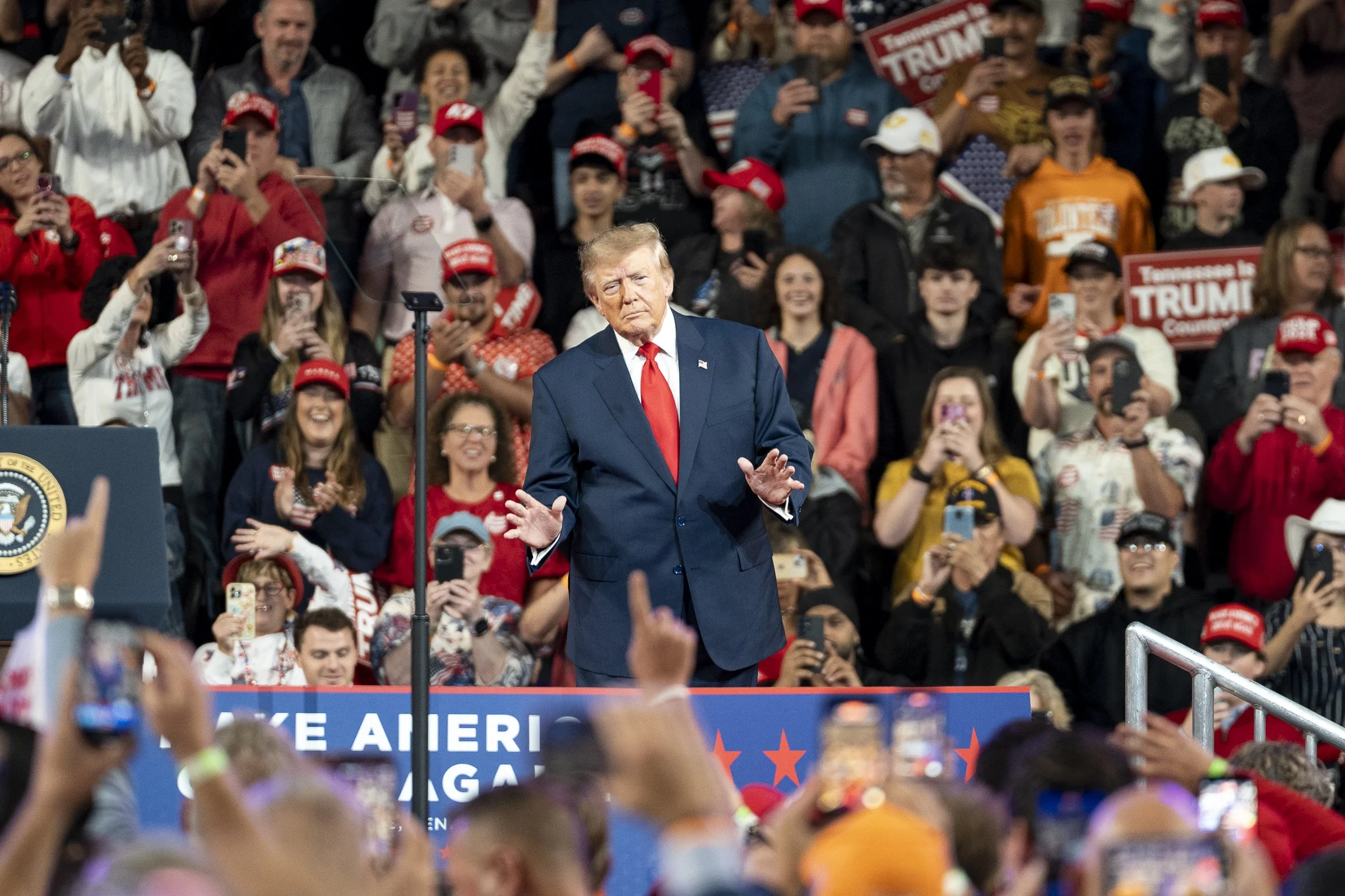  President Donald Trump dances to his entrance music as the crowd cheers. 