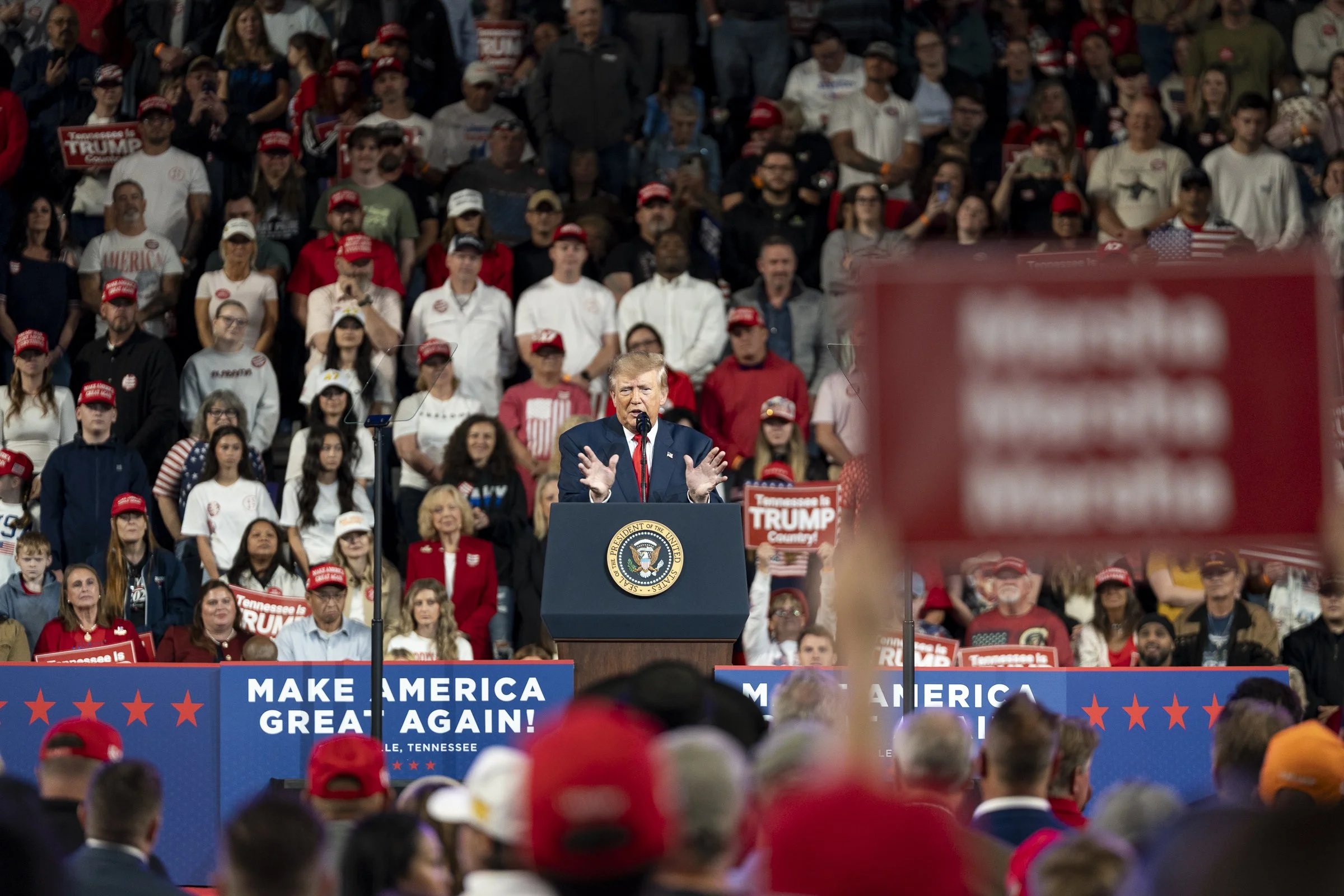  President Donald Trump addresses the crowd from the podium as attendees look on during the Republican midterm campaign rally at F&amp;M Bank Arena in Clarksville, Tennessee, on October 10, 2026. 