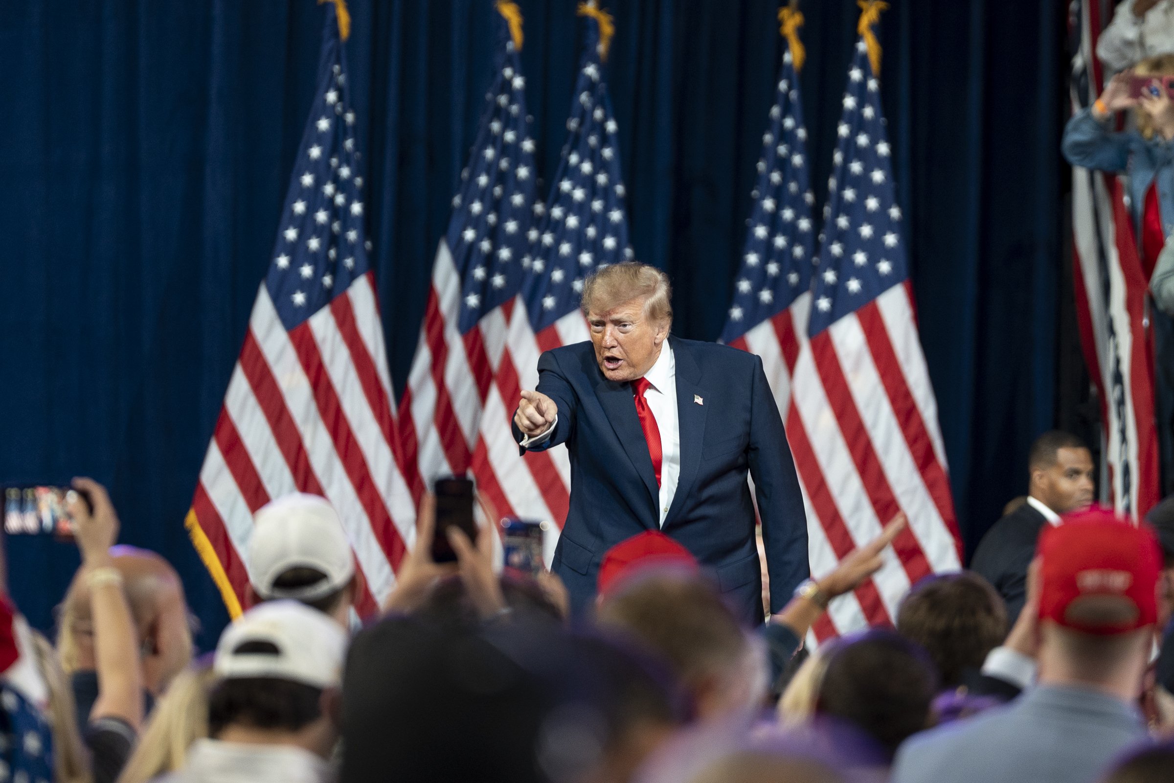  President Trump says thank you and points at guests in attendance.  