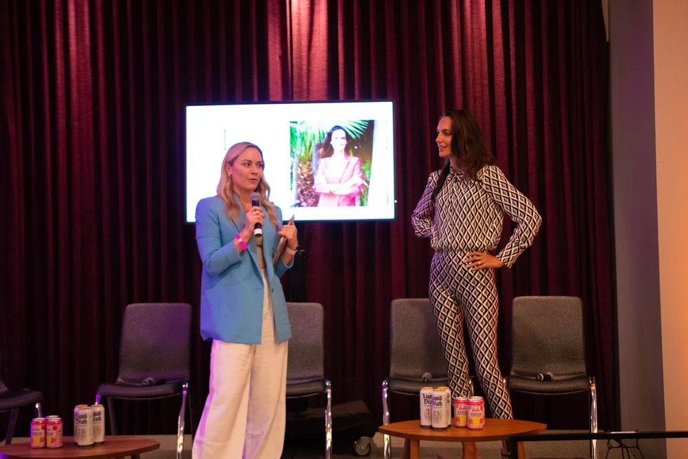 Speakers on stage at the STACKED Summit