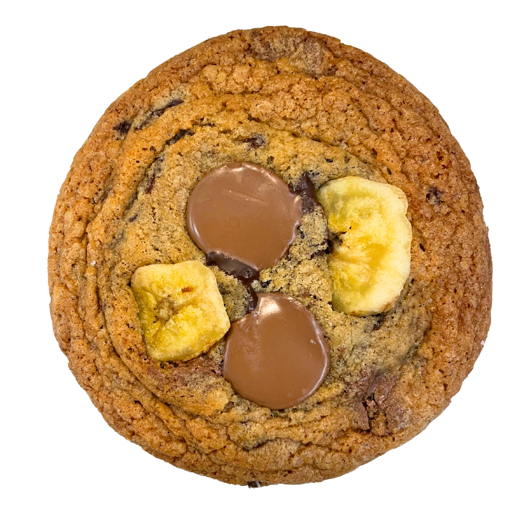 Chocolate chip cookie with colorful candy pieces and melted chocolate.