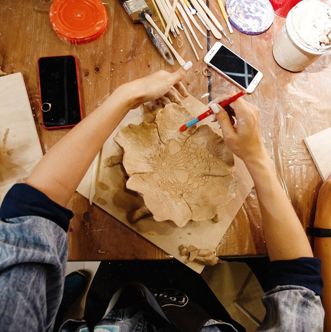 pottery classes near me clay modeling at the table