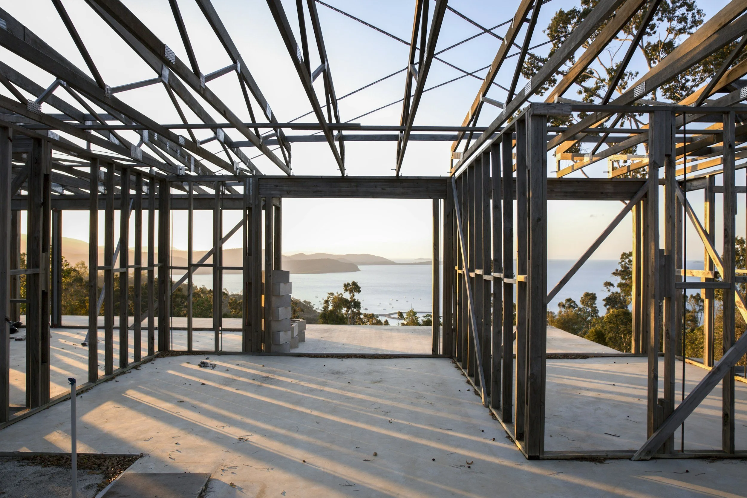 Couple reviewing plans for a new home build and construction loan