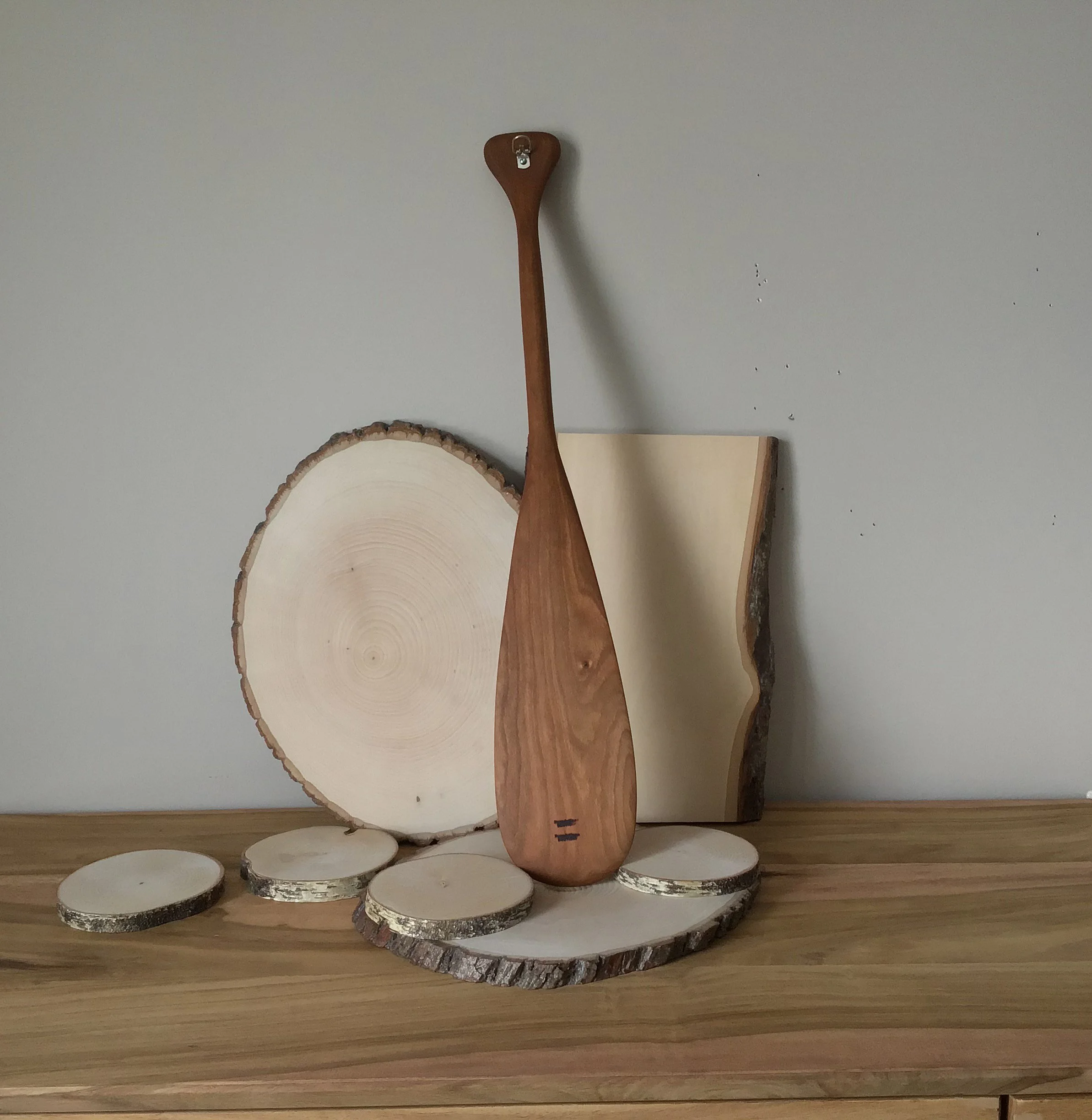 Compass rose on wooden paddle