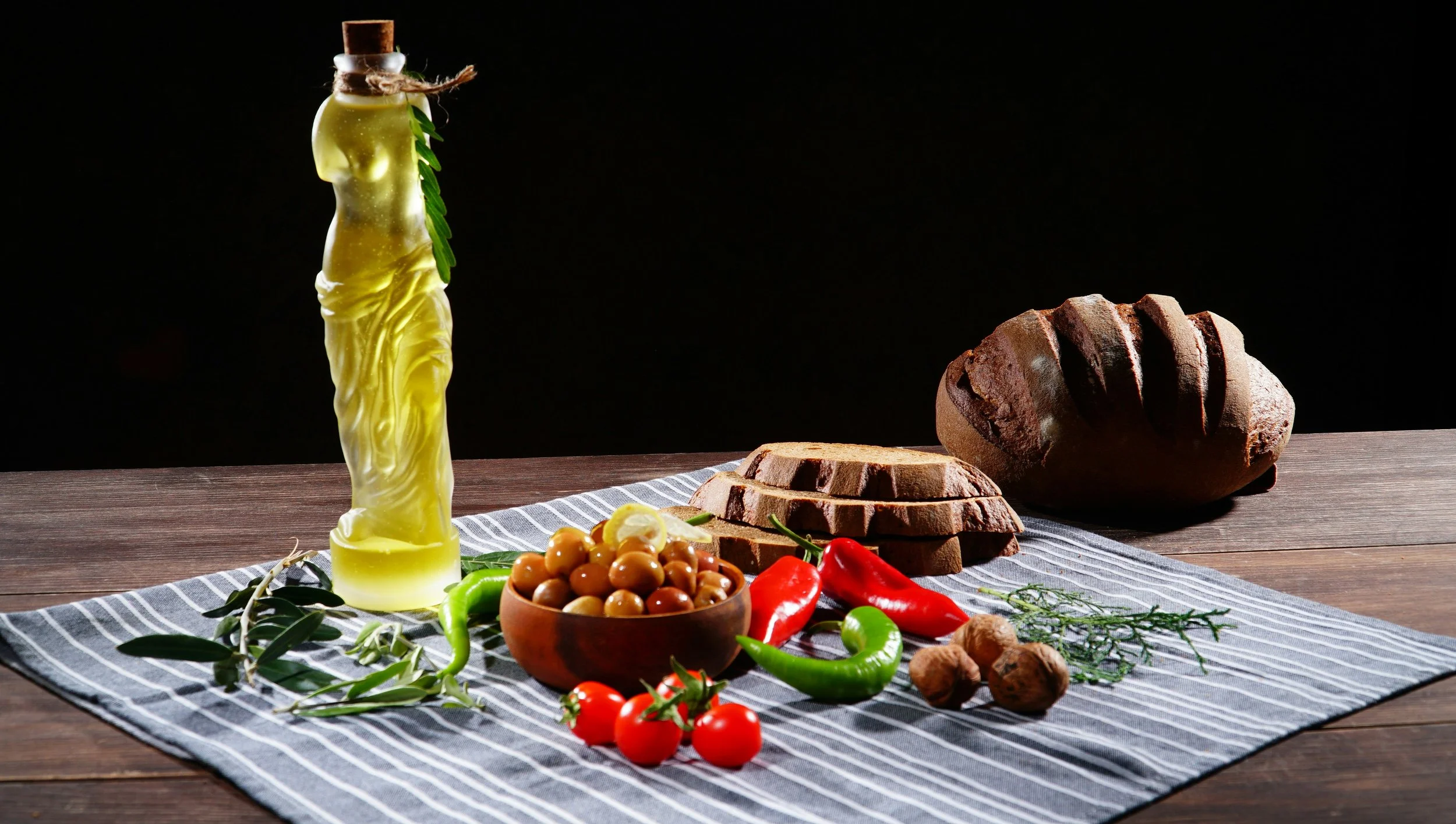 Olive oil in Greek sculpture bottle