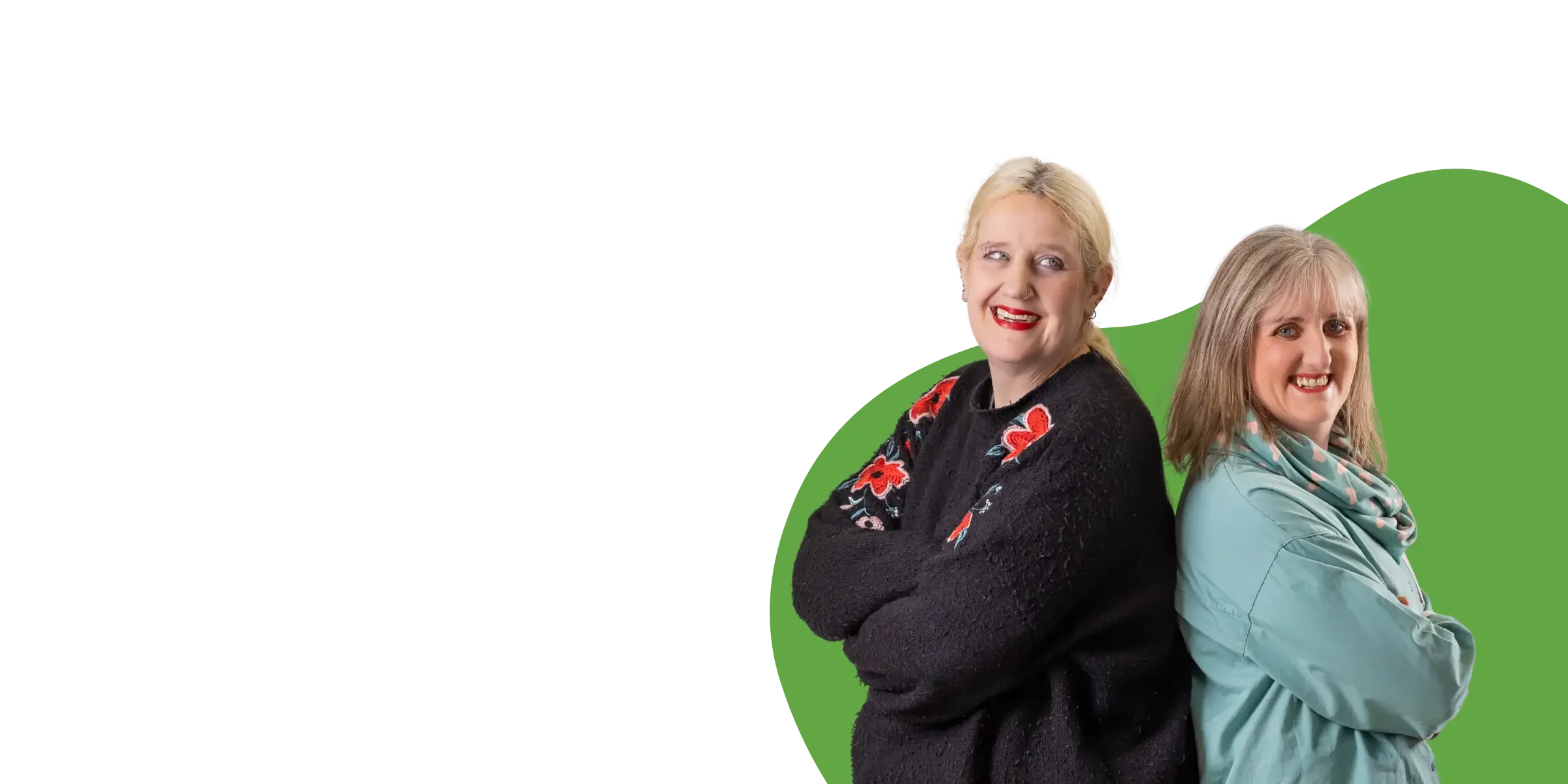 Two women smiling together representing disability support team