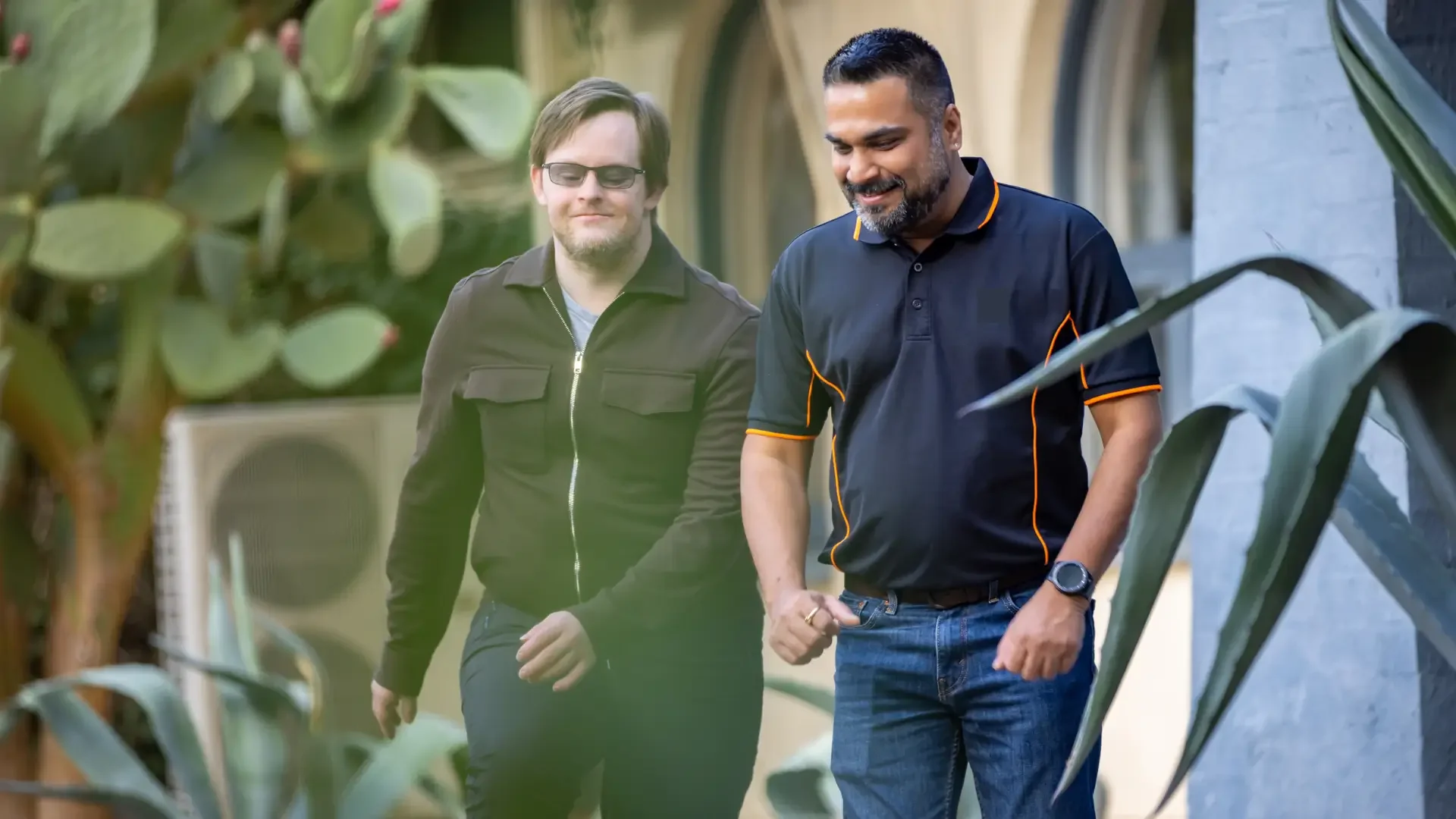 ONCALL support worker walking outdoors with a participant in Geelong, providing personalised disability support services.