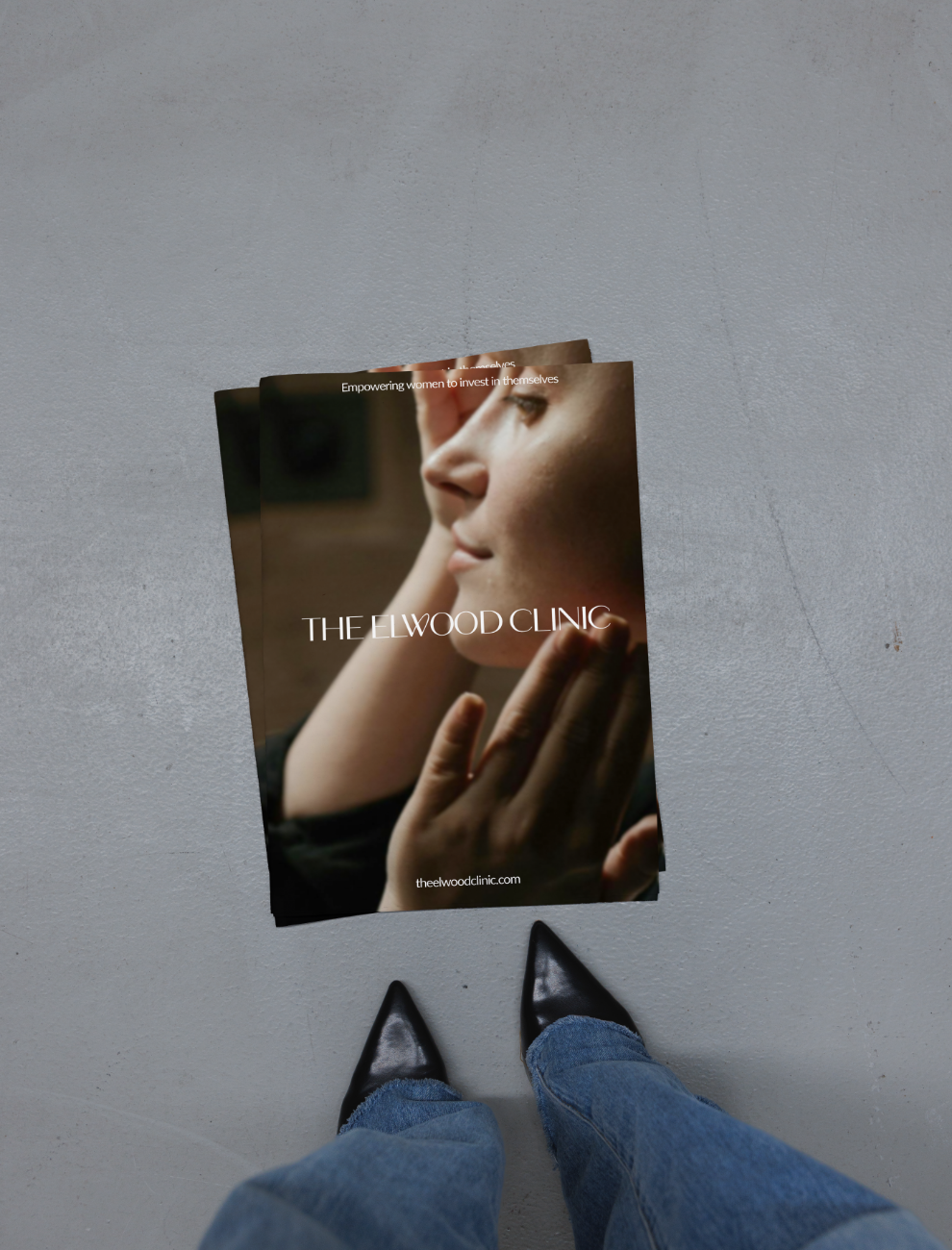 The Elwood Clinic flyer and brand collateral mockup — print design by Sunday Noon