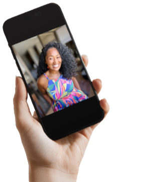 JoYi Rhyss, curly hair wearing a colorful dress and smiling, appears on a smartphone  held by a hand of someone reaching out for support.