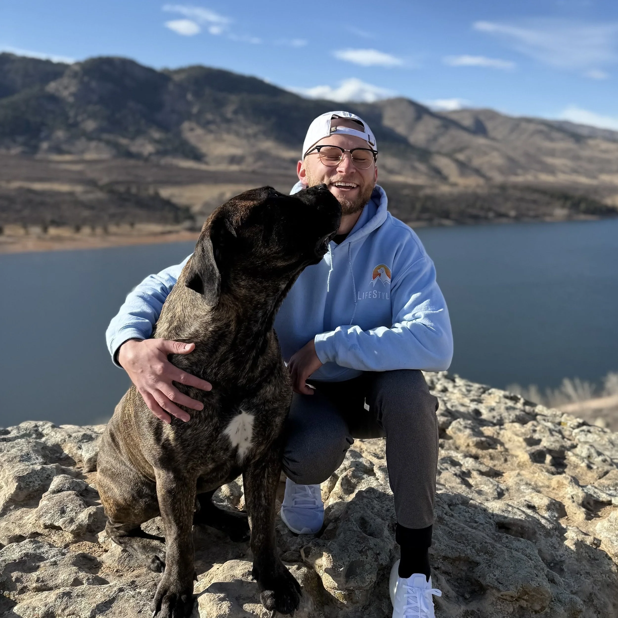 Drew with a dog outdoors