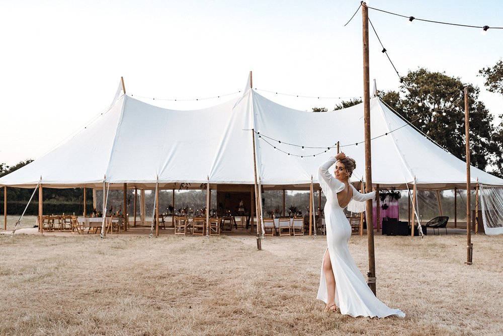sailcloth tent for a festival styled wedding with bride in shikoba wedding dress