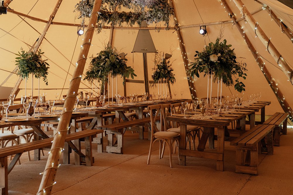 serentipi wedding tipi with high table centrepieces
