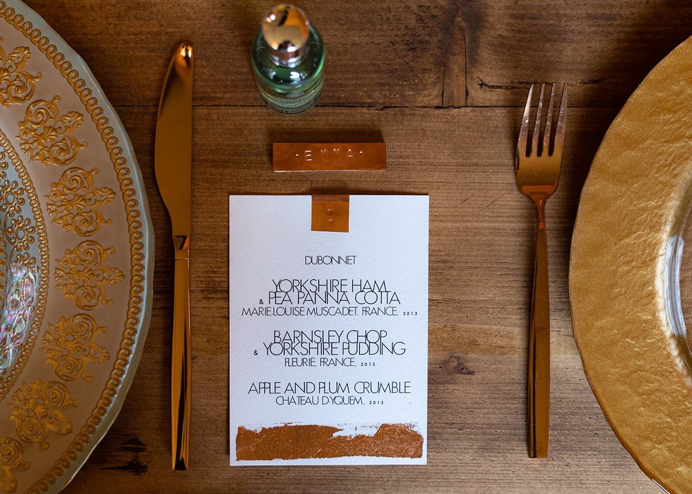 yorkshire wedding menu with copper foiling and molten brown wedding favours