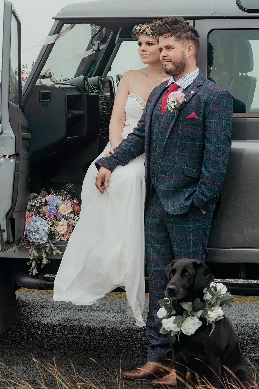 groom in tweed suit with dog flower crown