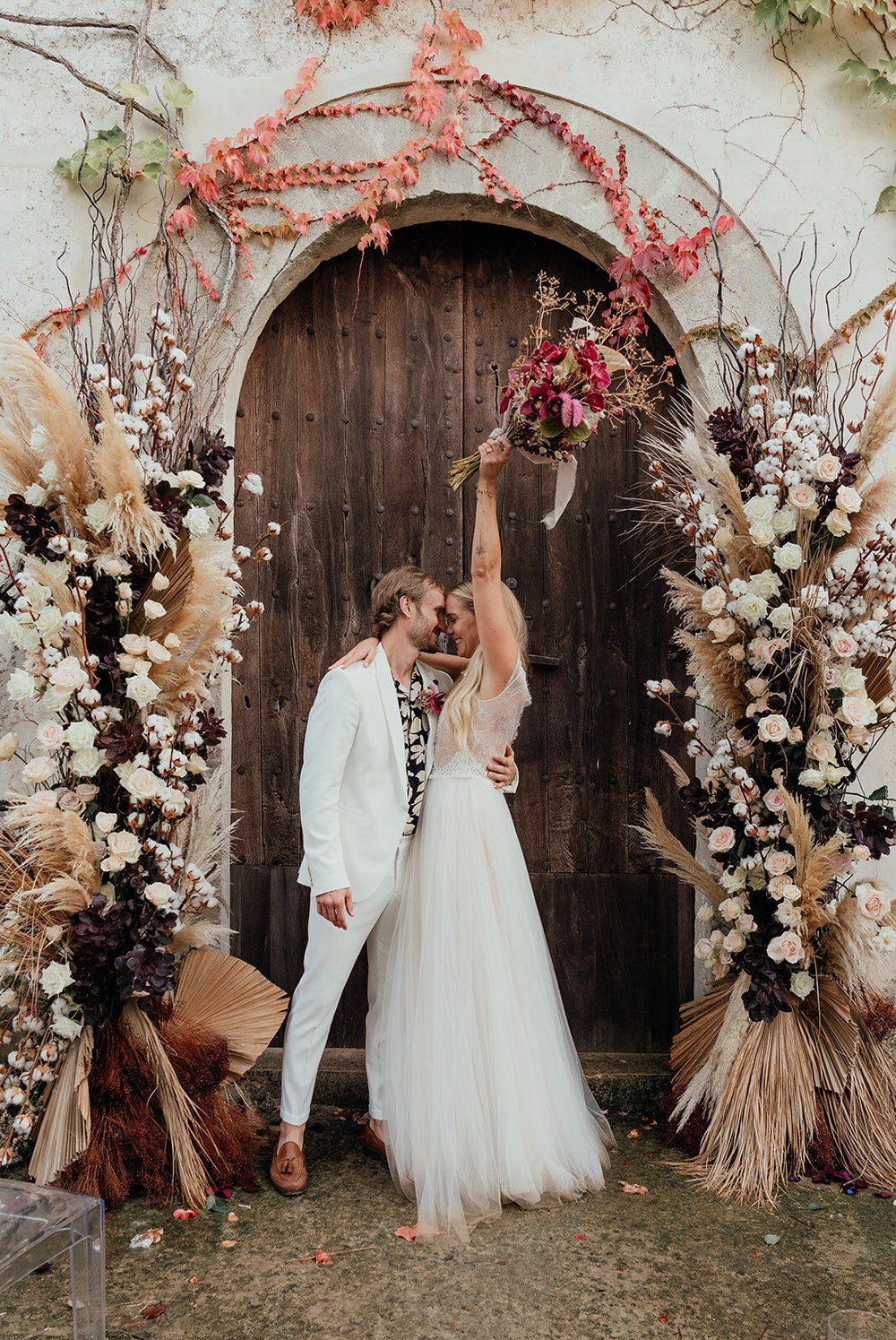 cotton stem wedding florals with luxe boho styling