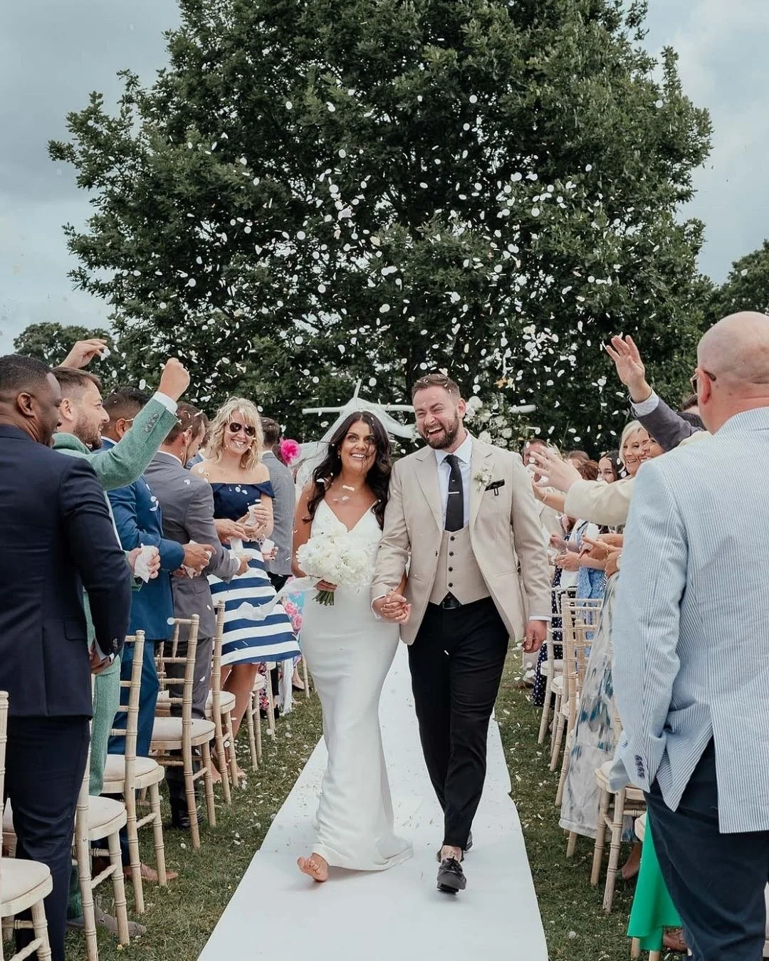 A throwback to Mia &amp; Steve&rsquo;s festival wedding
 A barefoot bride, an outdoor ceremony beneath the old oak tree, and a celebration that felt like pure joy from start to finish.

Set in her parents&rsquo; garden with a marquee reception, festi