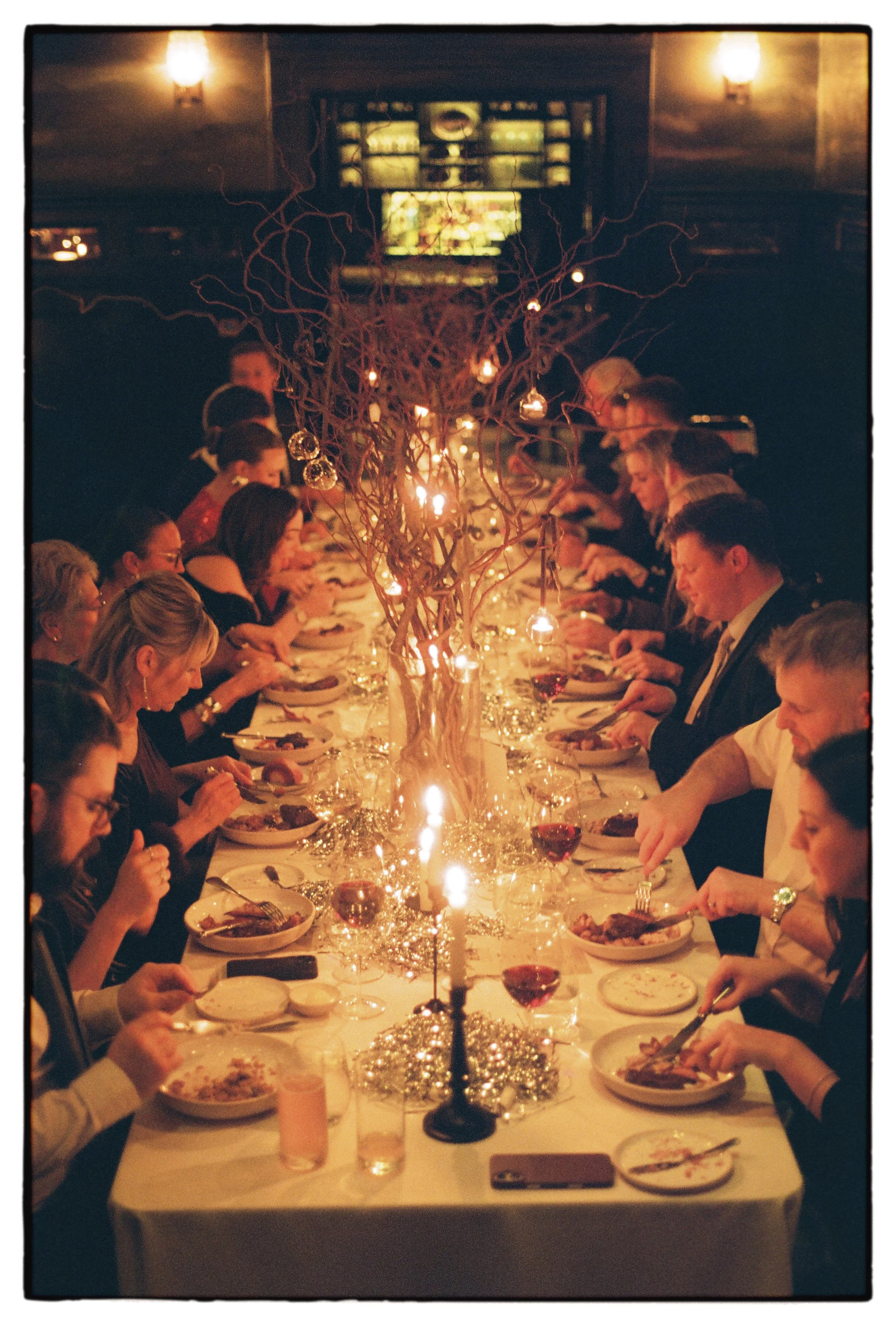 Ambient candle lit wedding breakfast at The Nomad Hotel London in Covent Garden shot on 35mm film