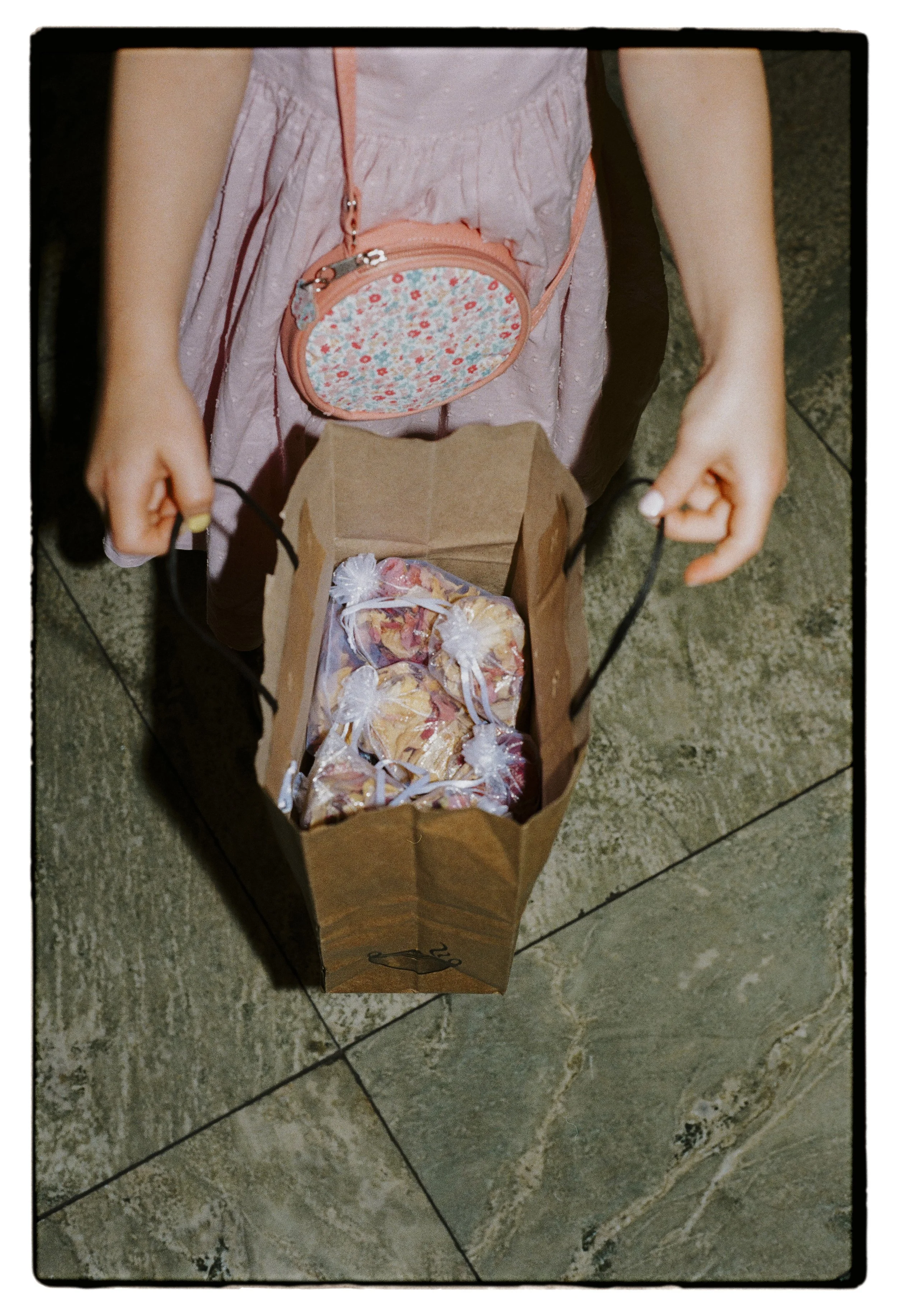 flower girl holding confetti at Hackney Town Hall on 35mm film
