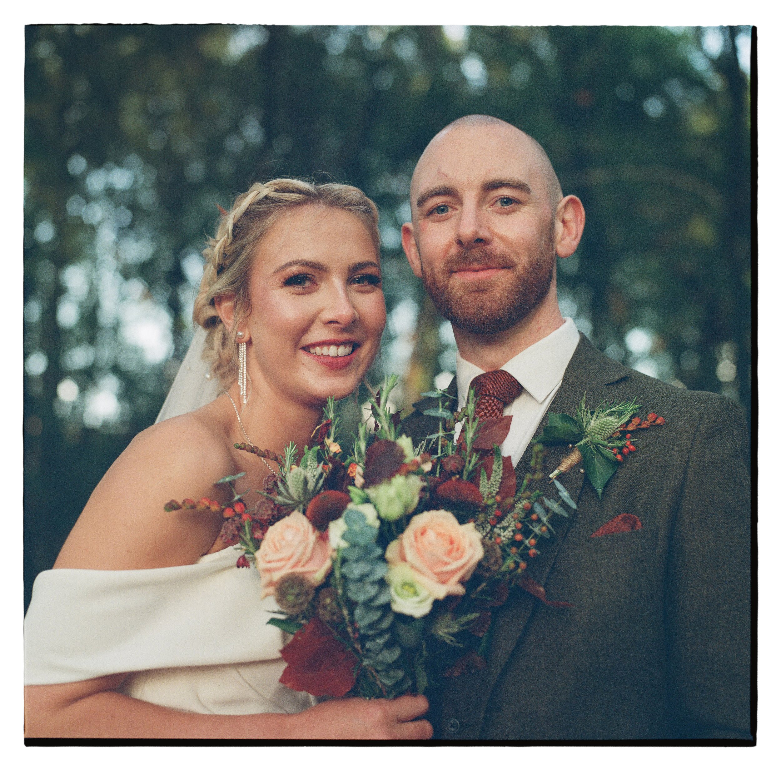 Couple wedding pose in woodland shot on medium format film 120