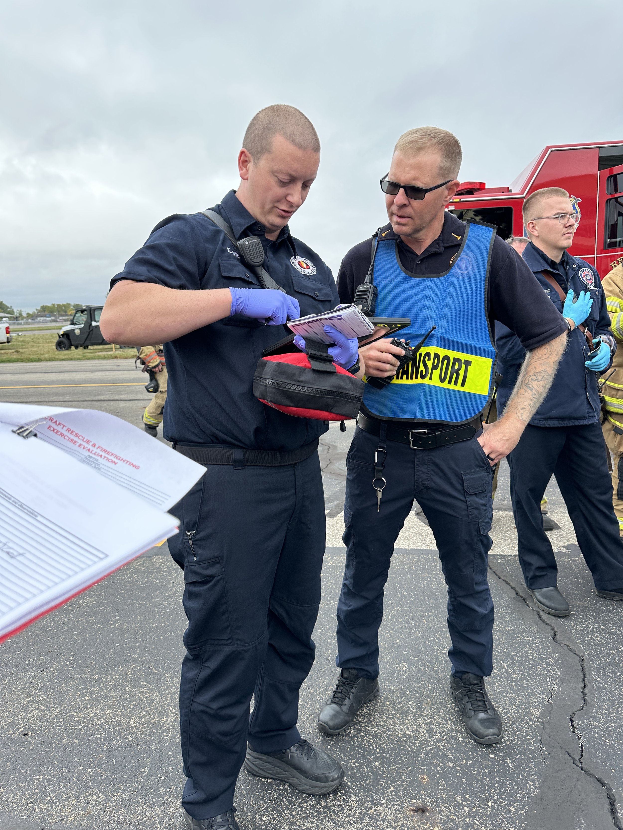 The Transport Commander communicating by radio. 