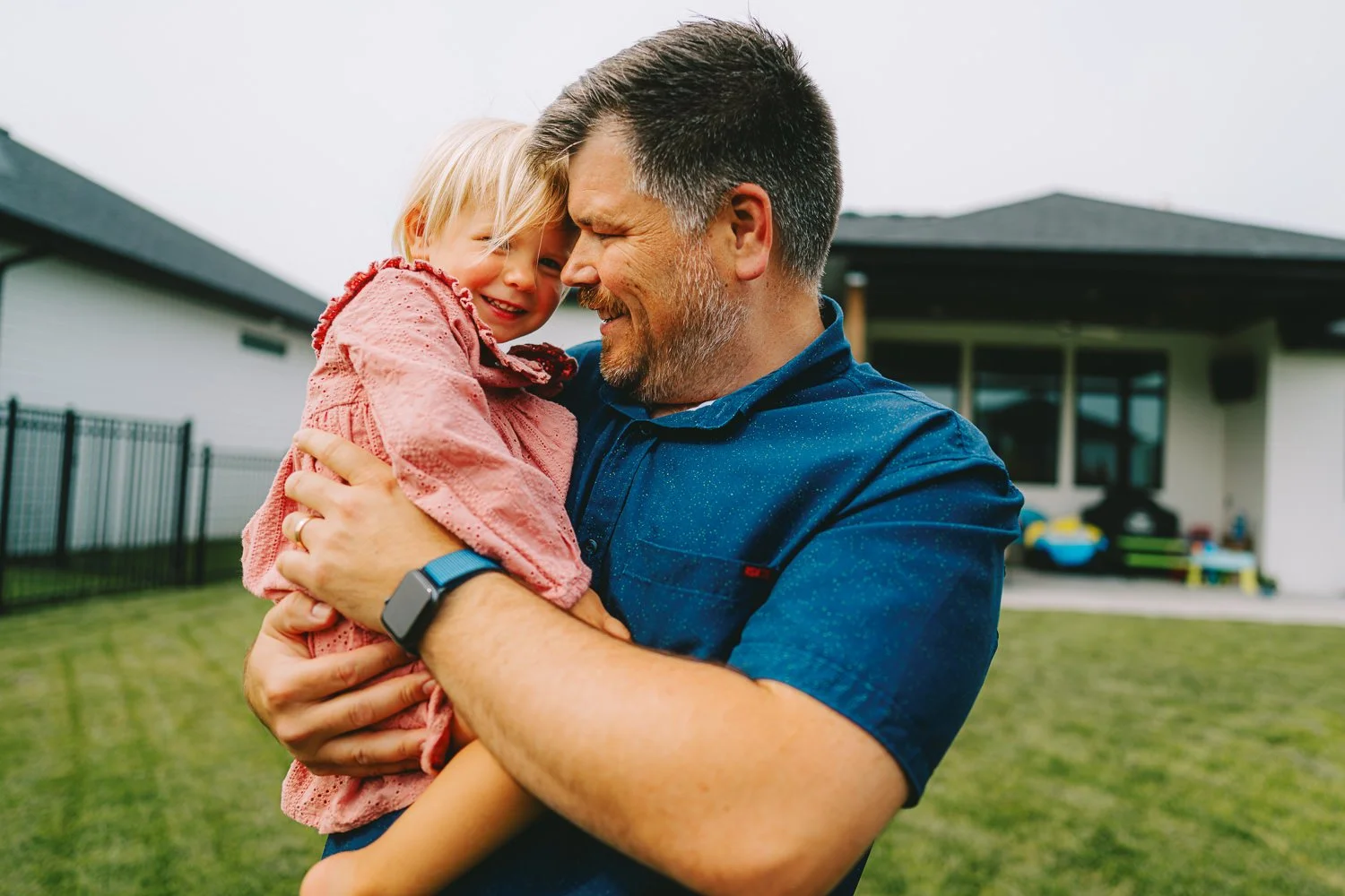 Authentic family moments, both indoors and outside, captured naturally in Lincoln.