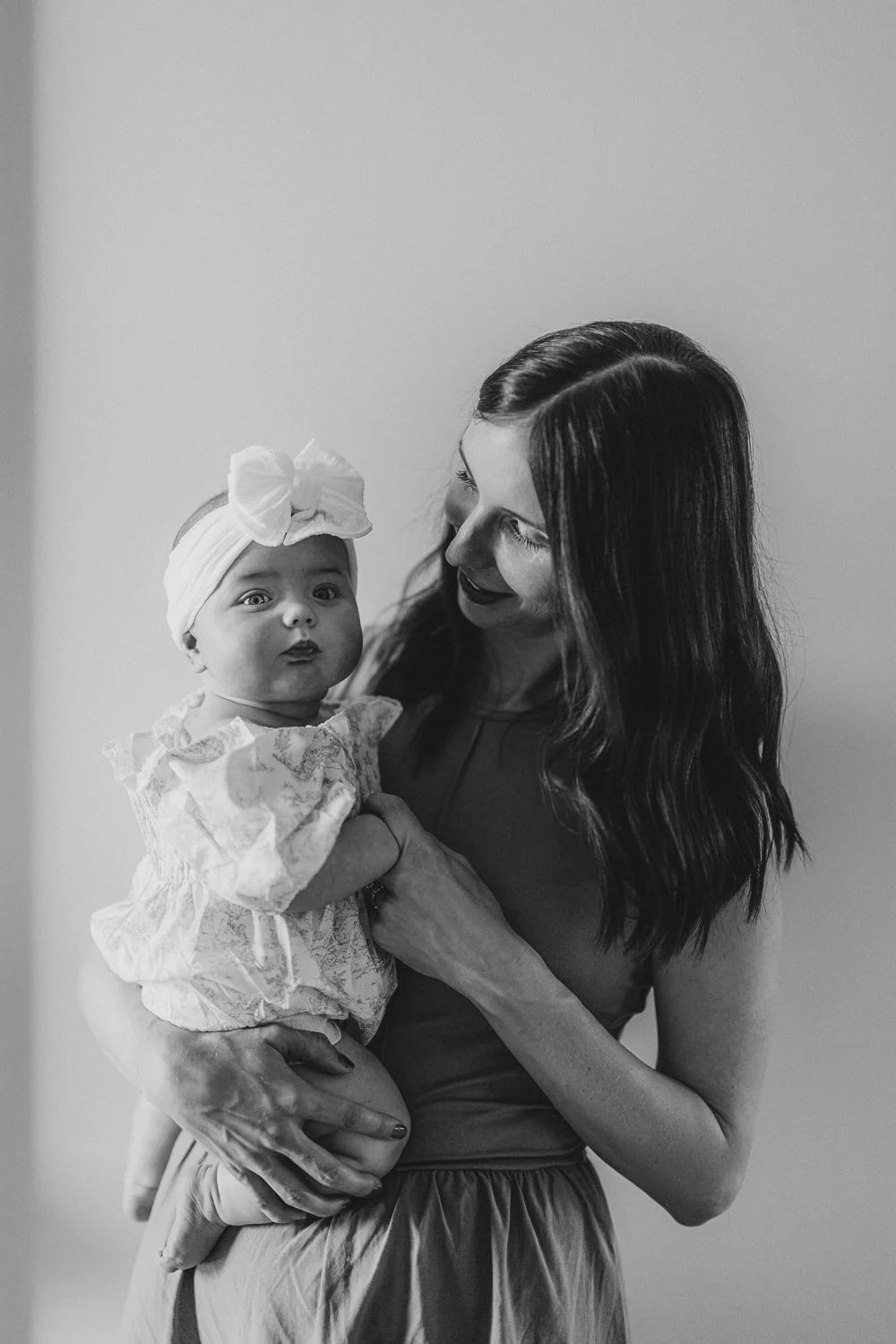 Authentic family moments, both indoors and outside, captured naturally in Lincoln.