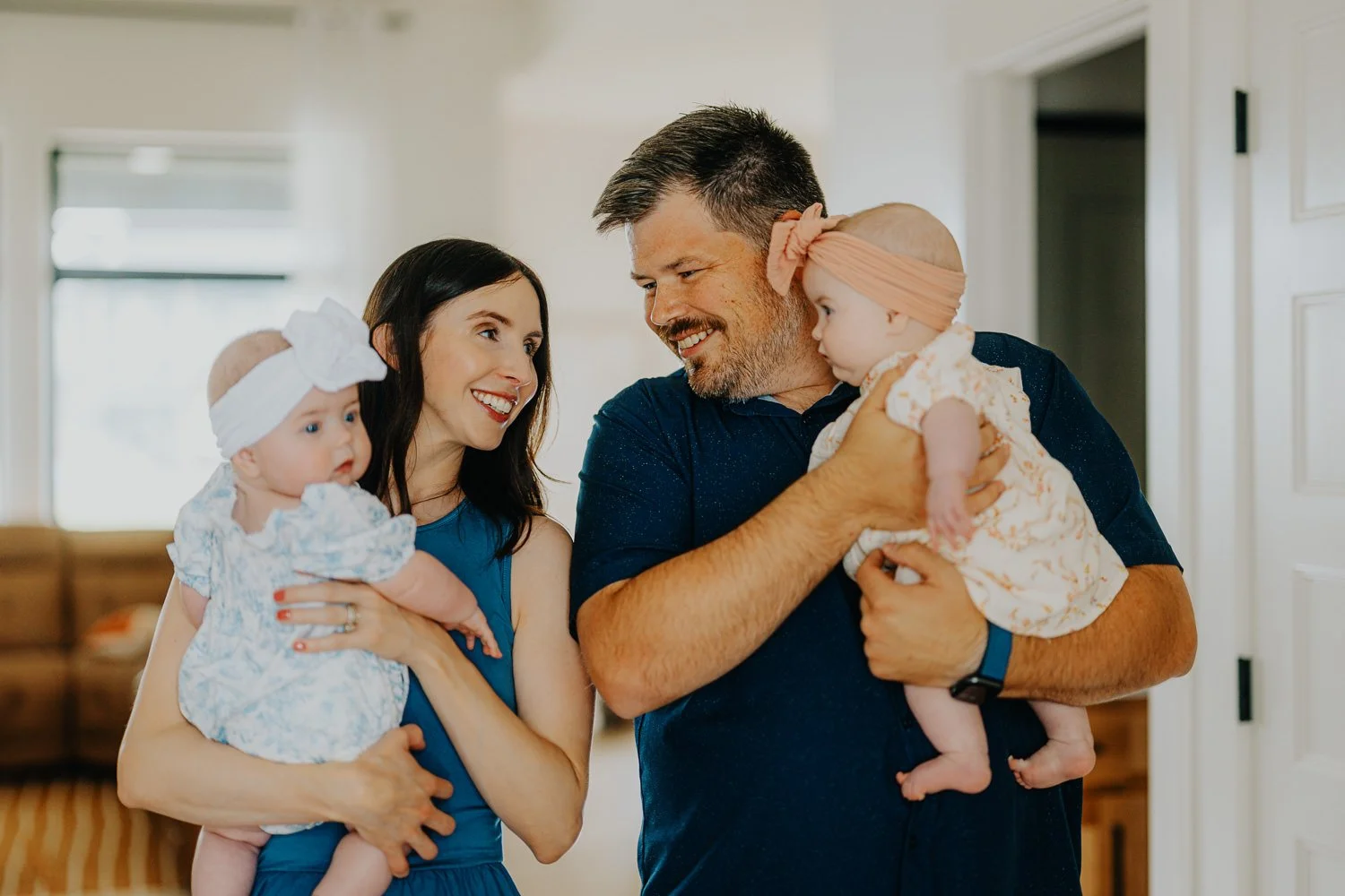 Authentic family moments, both indoors and outside, captured naturally in Lincoln.