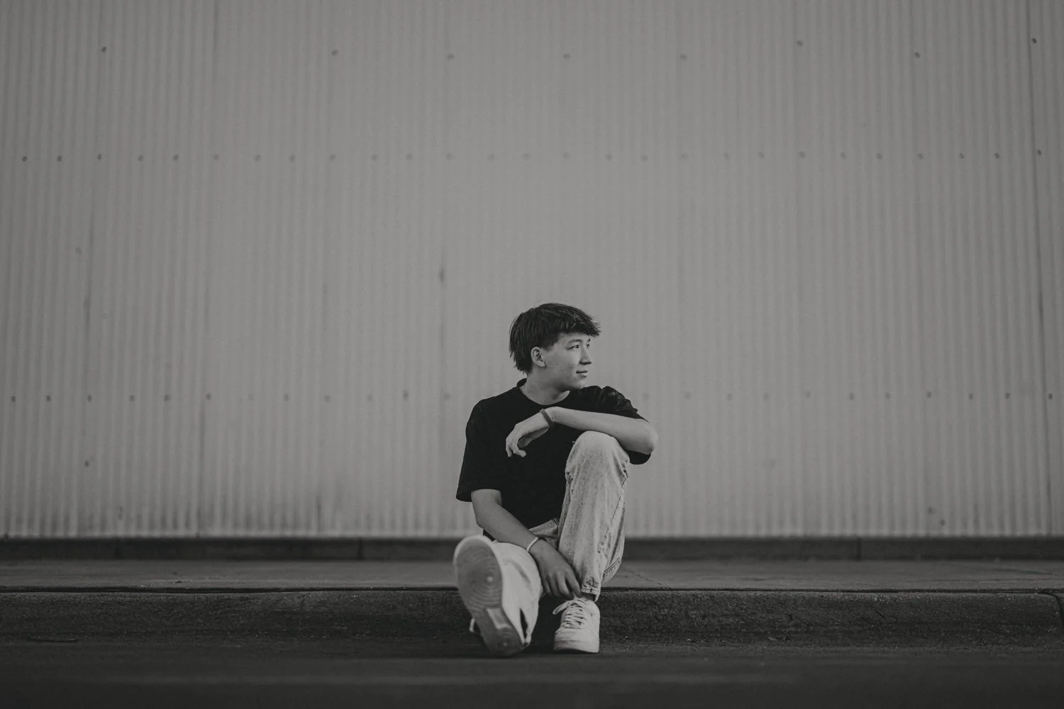 Lincoln NE senior photographer capturing urban senior photos downtown