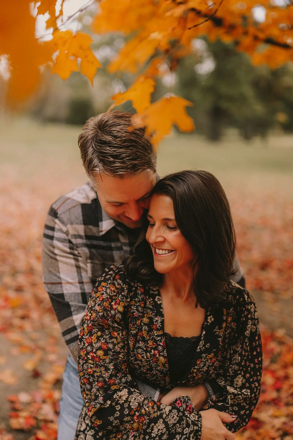 Relaxed family photos at Pioneers Park Lincoln Nebraska in fall