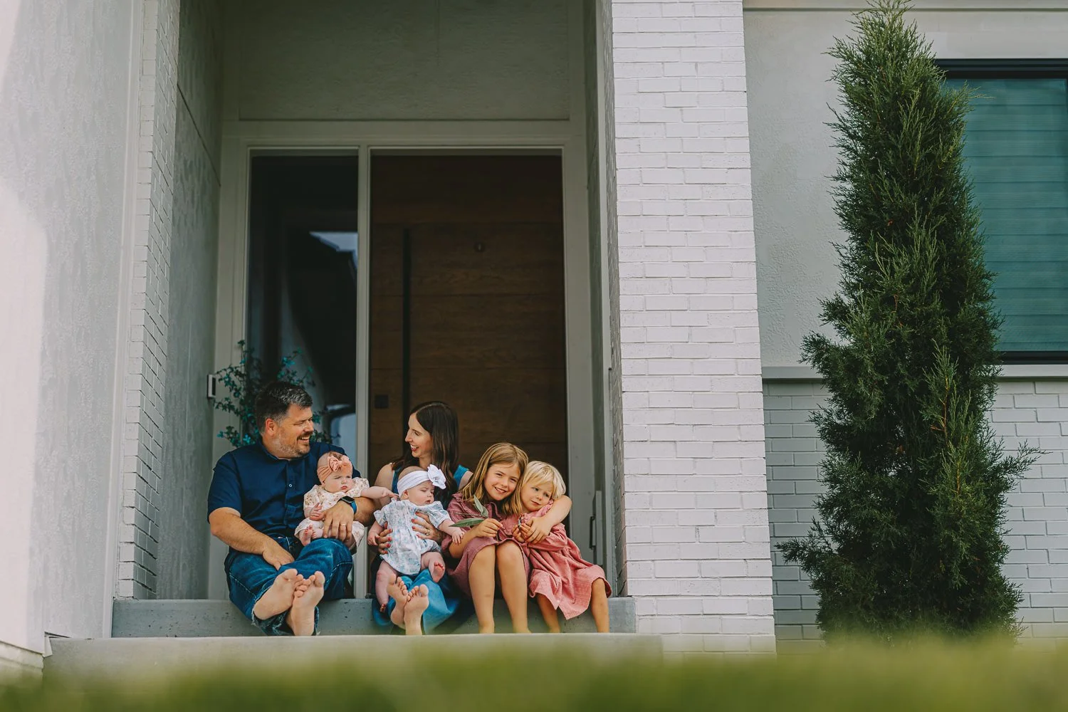 Authentic family moments, both indoors and outside, captured naturally in Lincoln.