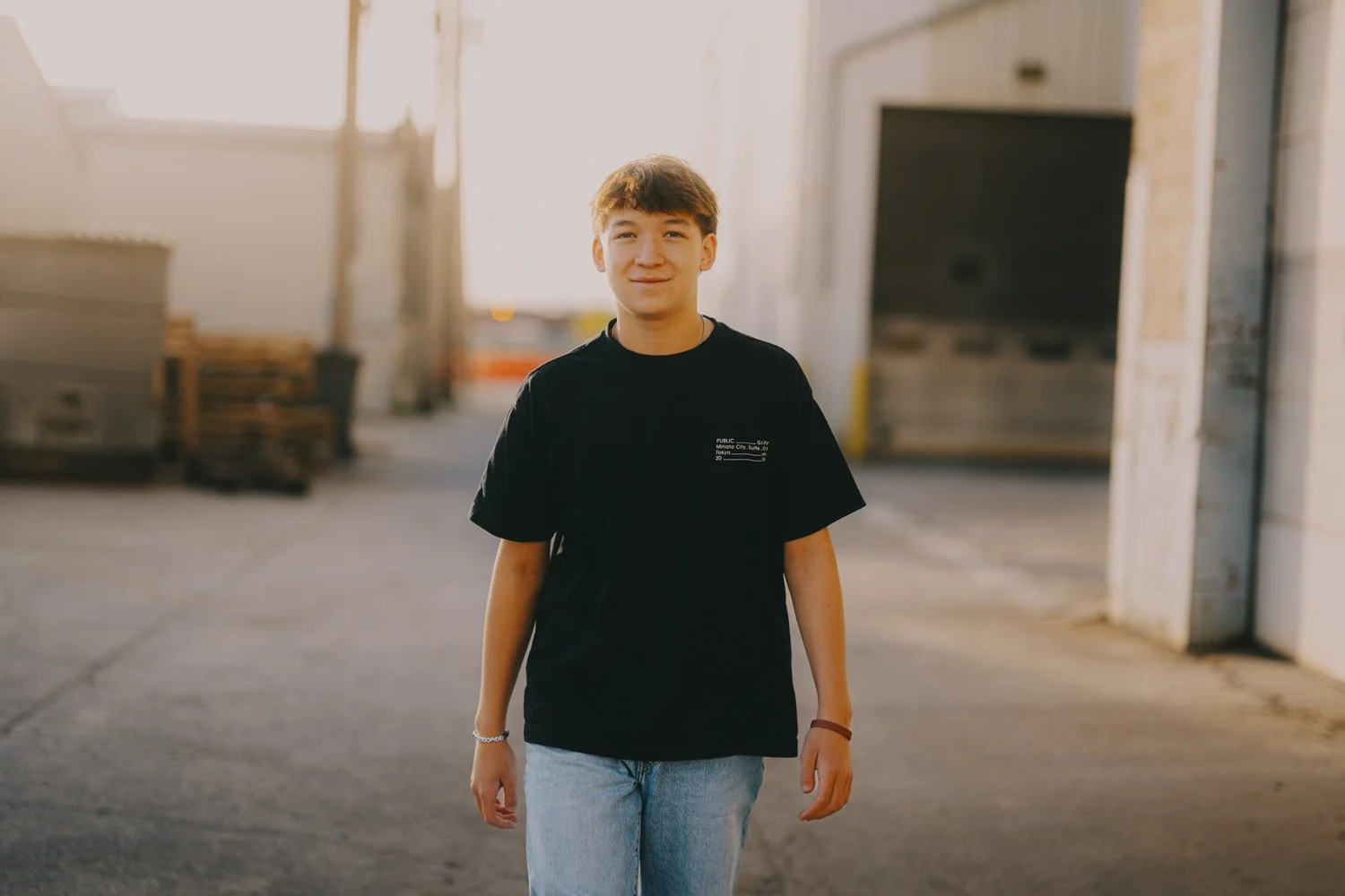 Senior portraits of Elliot in downtown Lincoln near the Haymarket