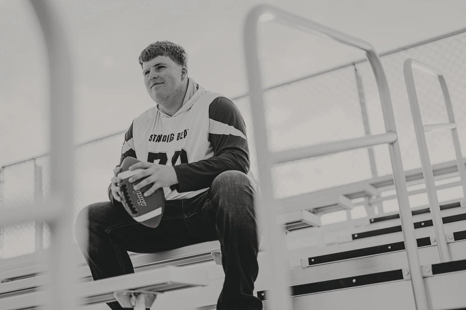 8. High school senior photos in natural light at sunset