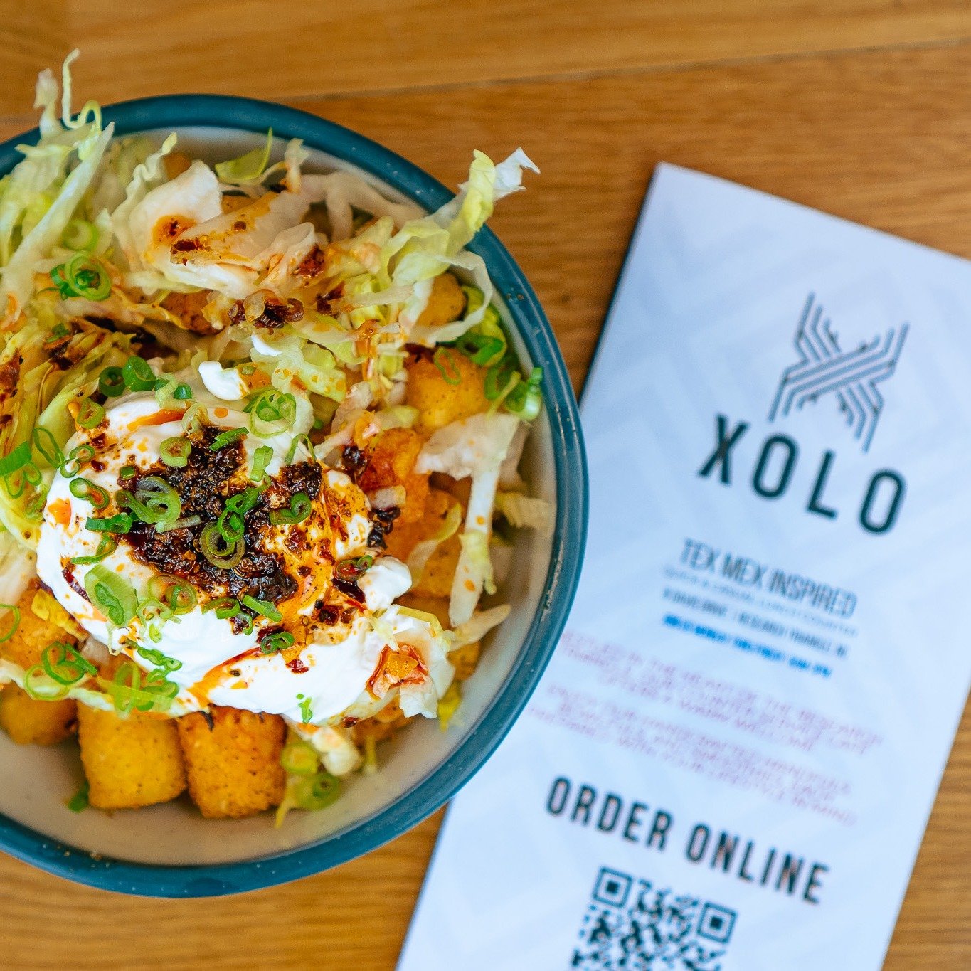 Spice up your day with our FIESTA TOTS at Xolo 🌶🎉 Crispy tots topped with Latin chili crisp, shredded lettuce, and a dollop of sour cream. Order online for pick-up! 🔥

Hit the link in our bio to join our Loyalty Program. Next time you stop in, sta