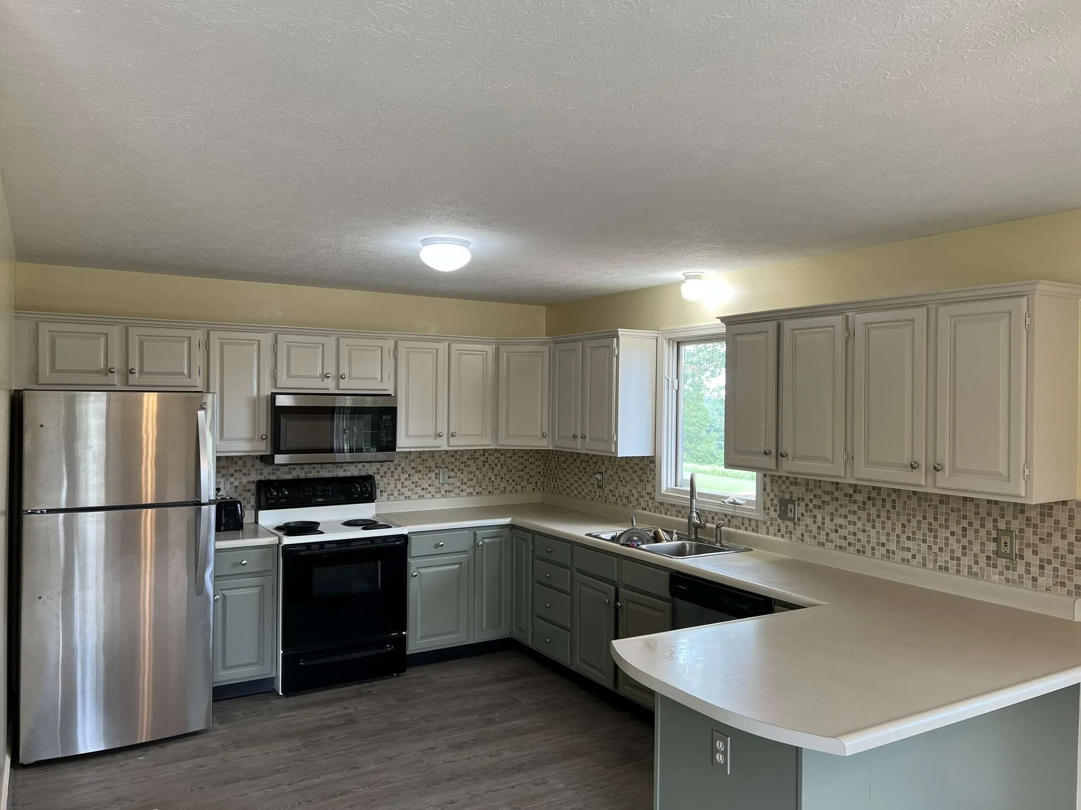 two toned painted kitchen cabinets