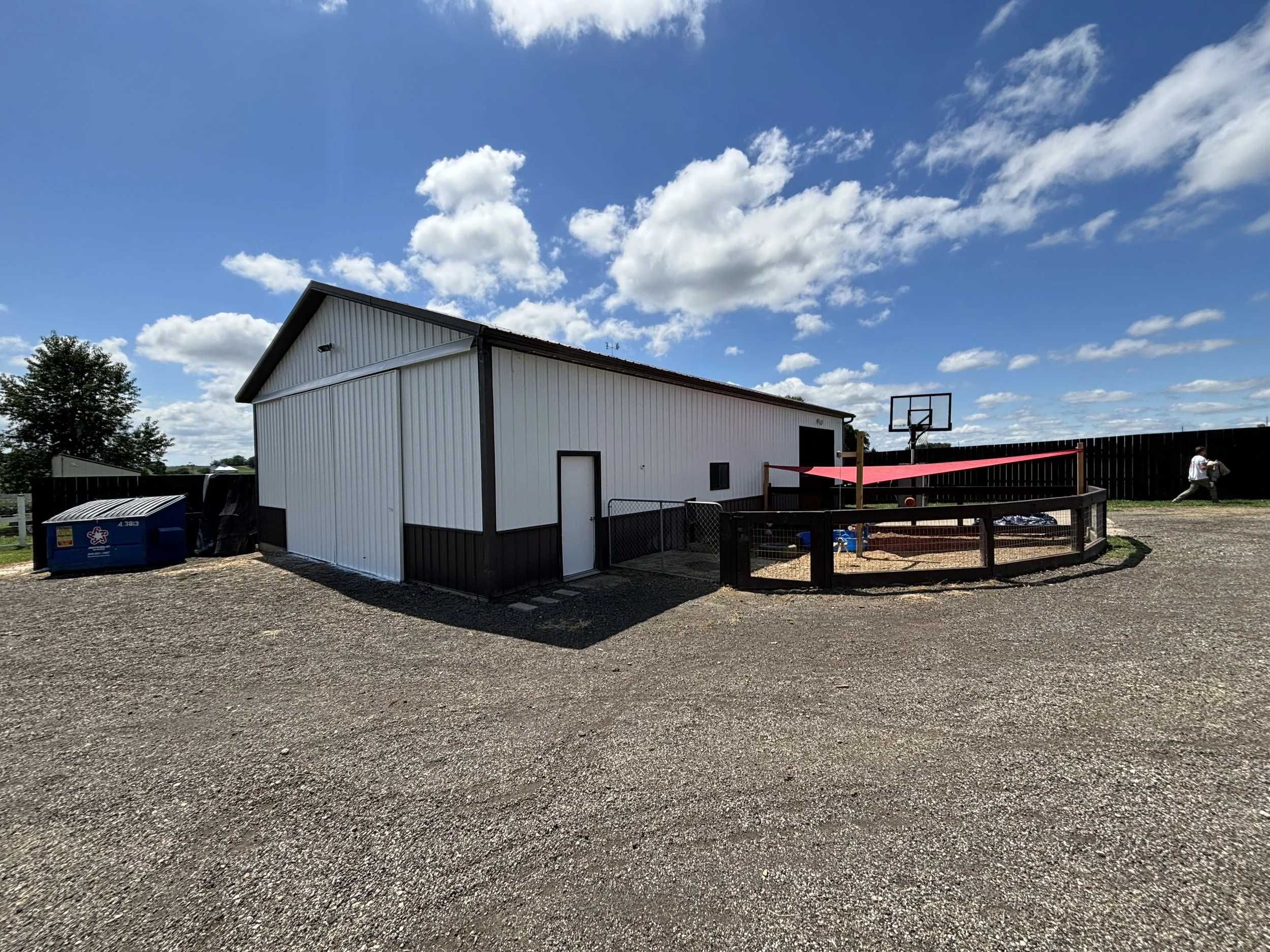 black and white pole barn
