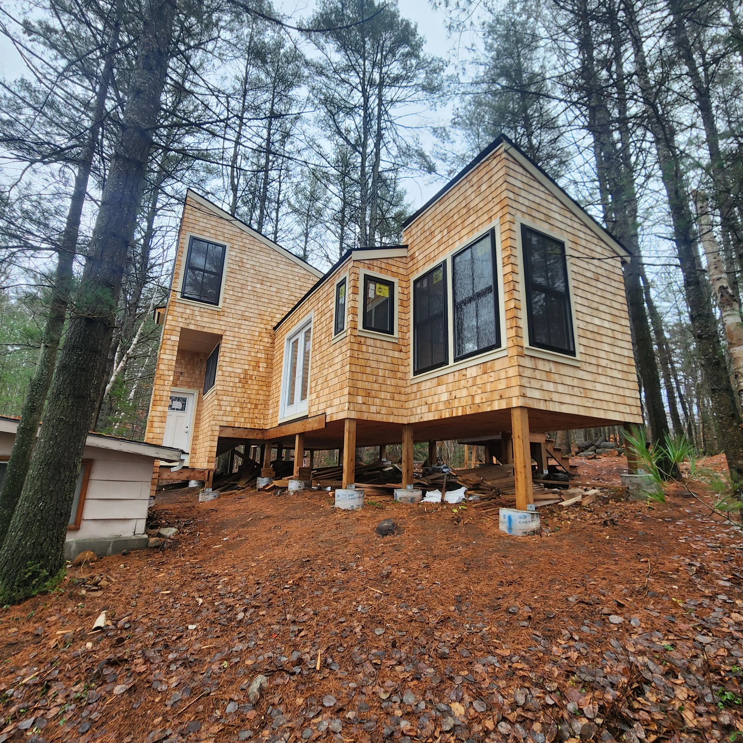 custom-cottage-build-cedar-shingle-elevated-design-baysville-muskoka.jpg