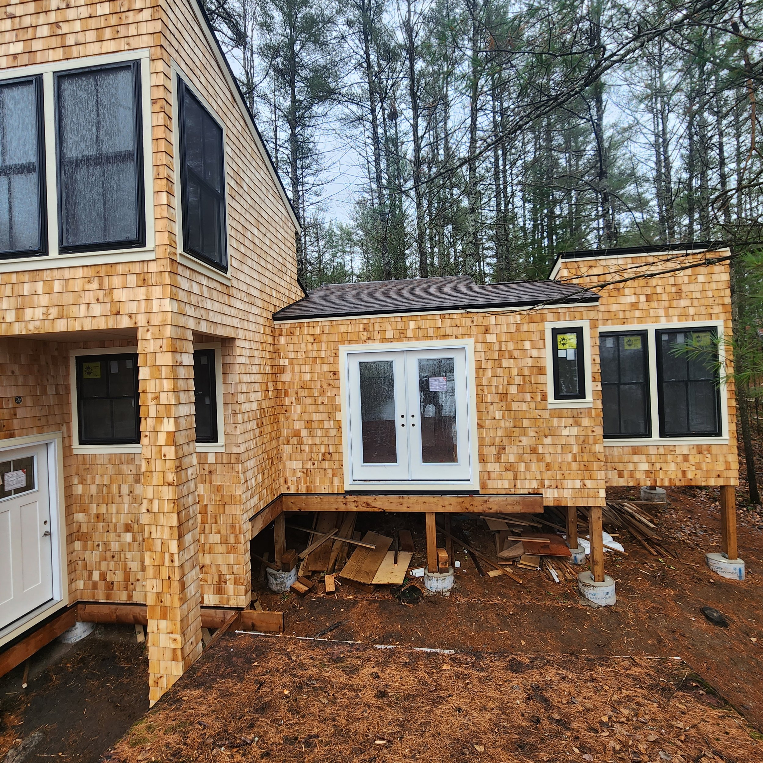 modern-cottage-construction-cedar-exterior-french-doors-baysville-muskoka-ontario.jpg