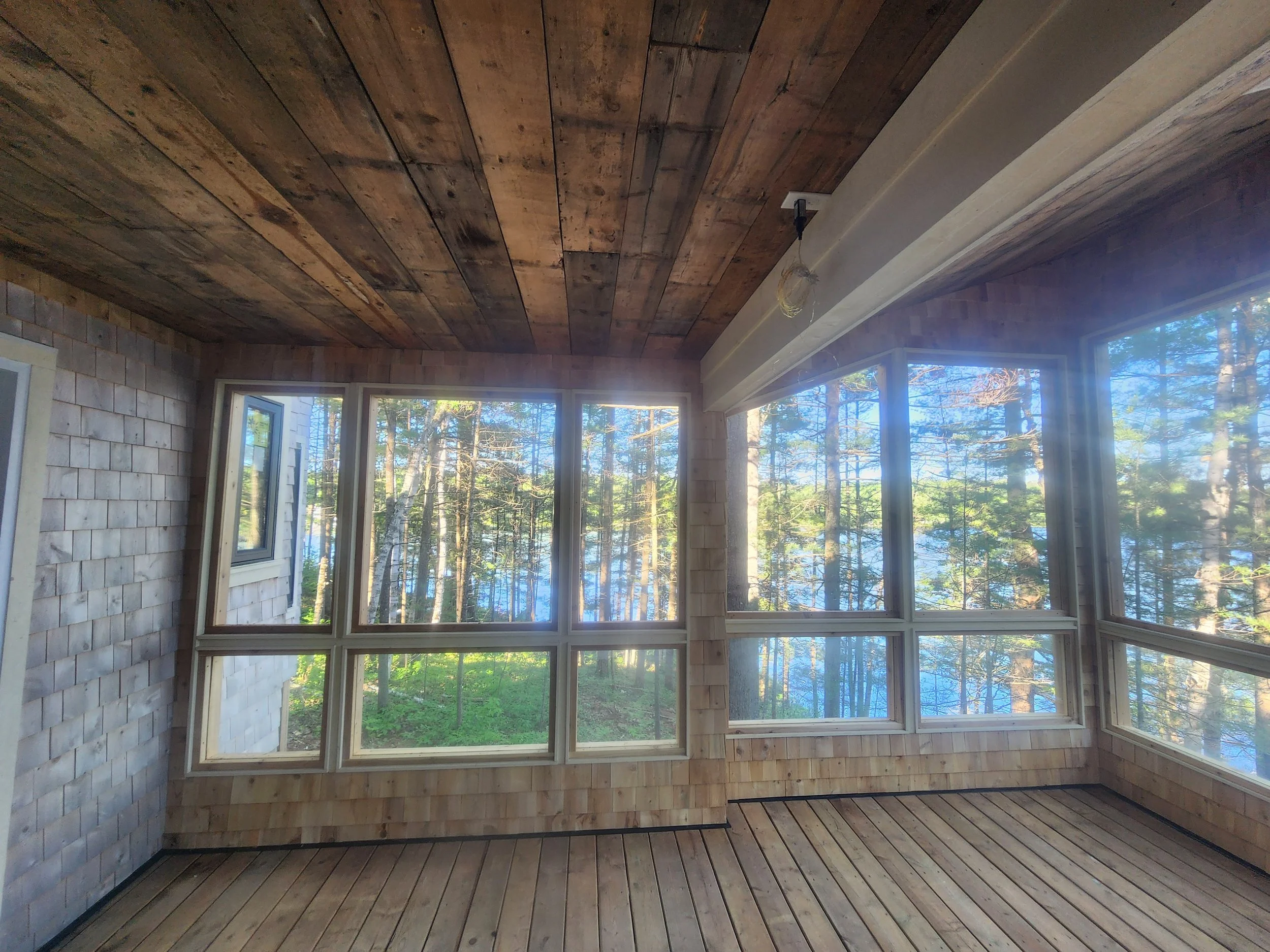 ground-up-constructing-muskoka-room-reclaimed-wood-ceiling.jpg