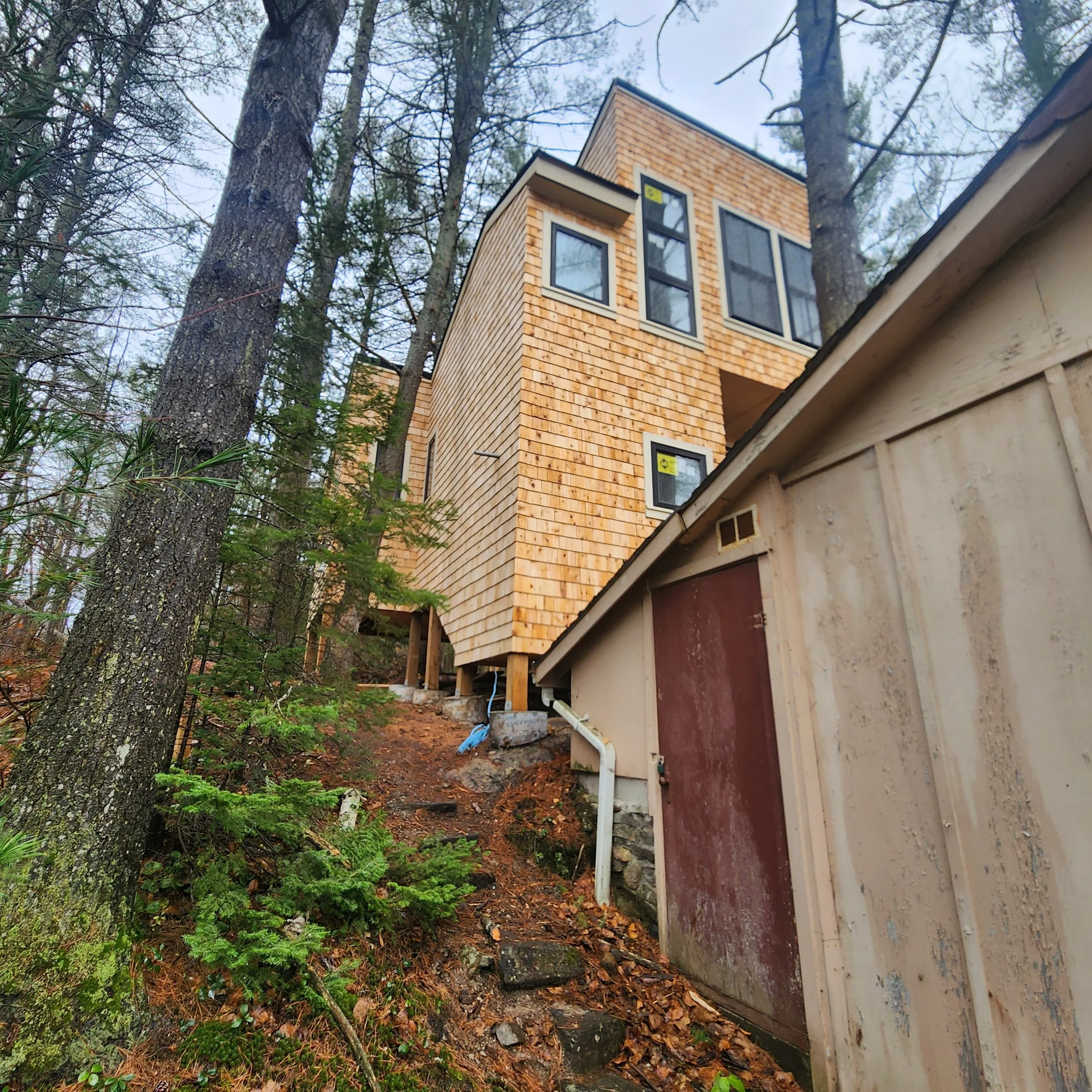 ground-up-constructing-muskoka-cottage-build-phase-1-new-build-old-cottage.jpg